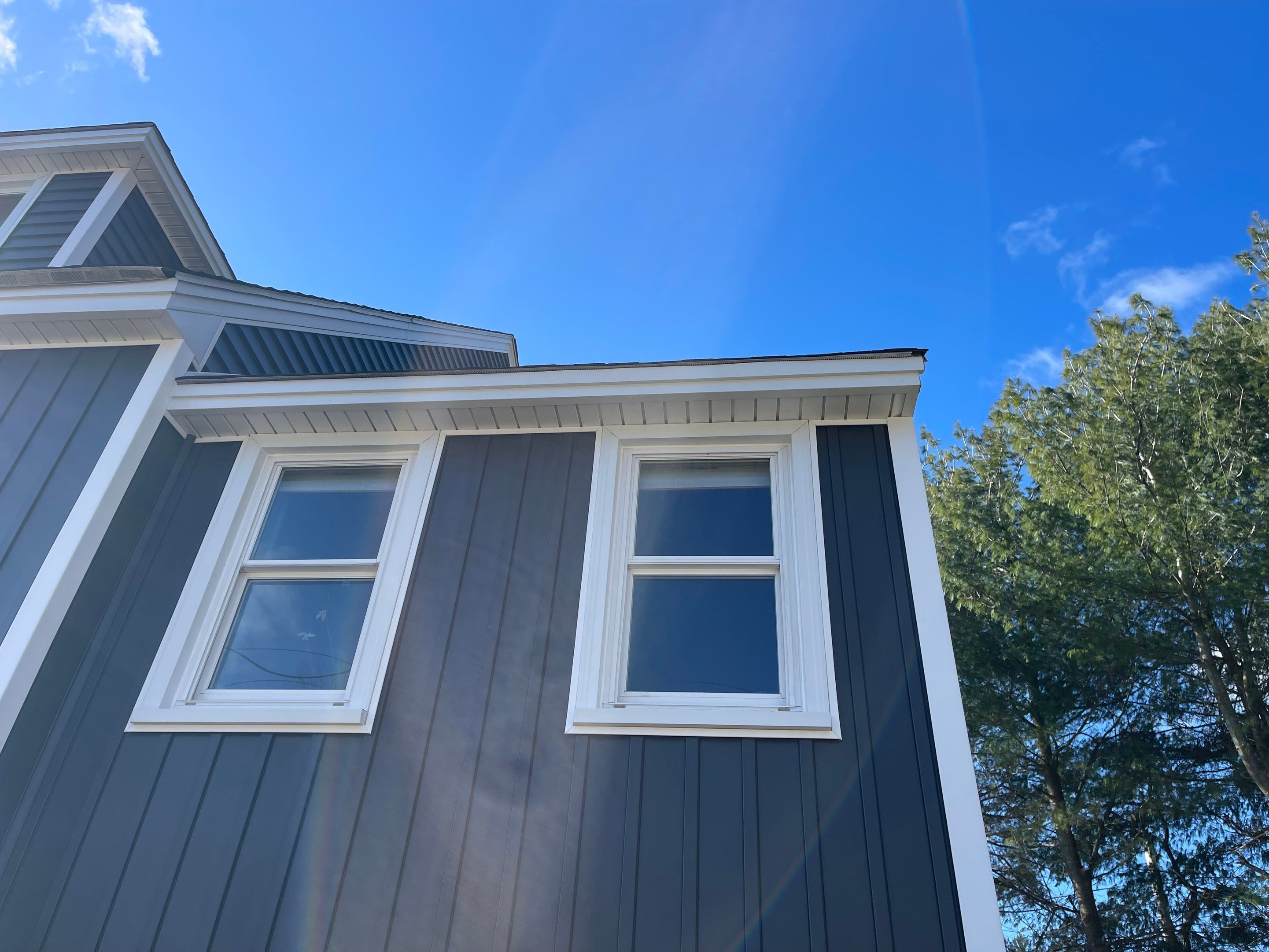Complete Exterior Renovation with New Siding & Gutters   by Sensible Home Solutions