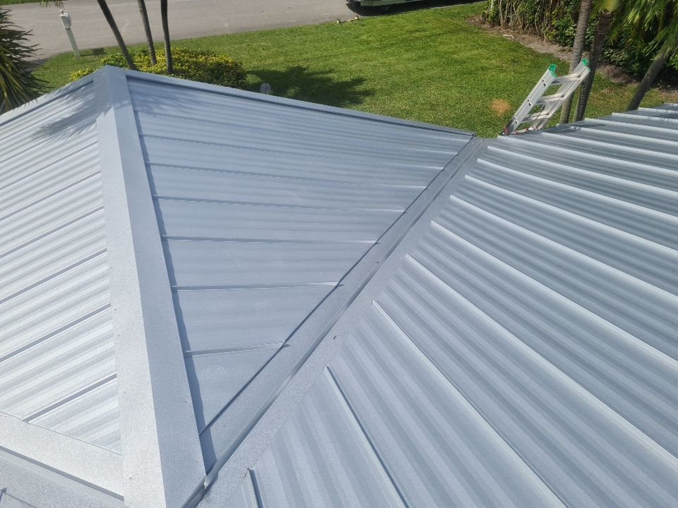 Residential Roofing Installation using 1" Nail strip metal roof by BLUES BROTHERS ROOFING