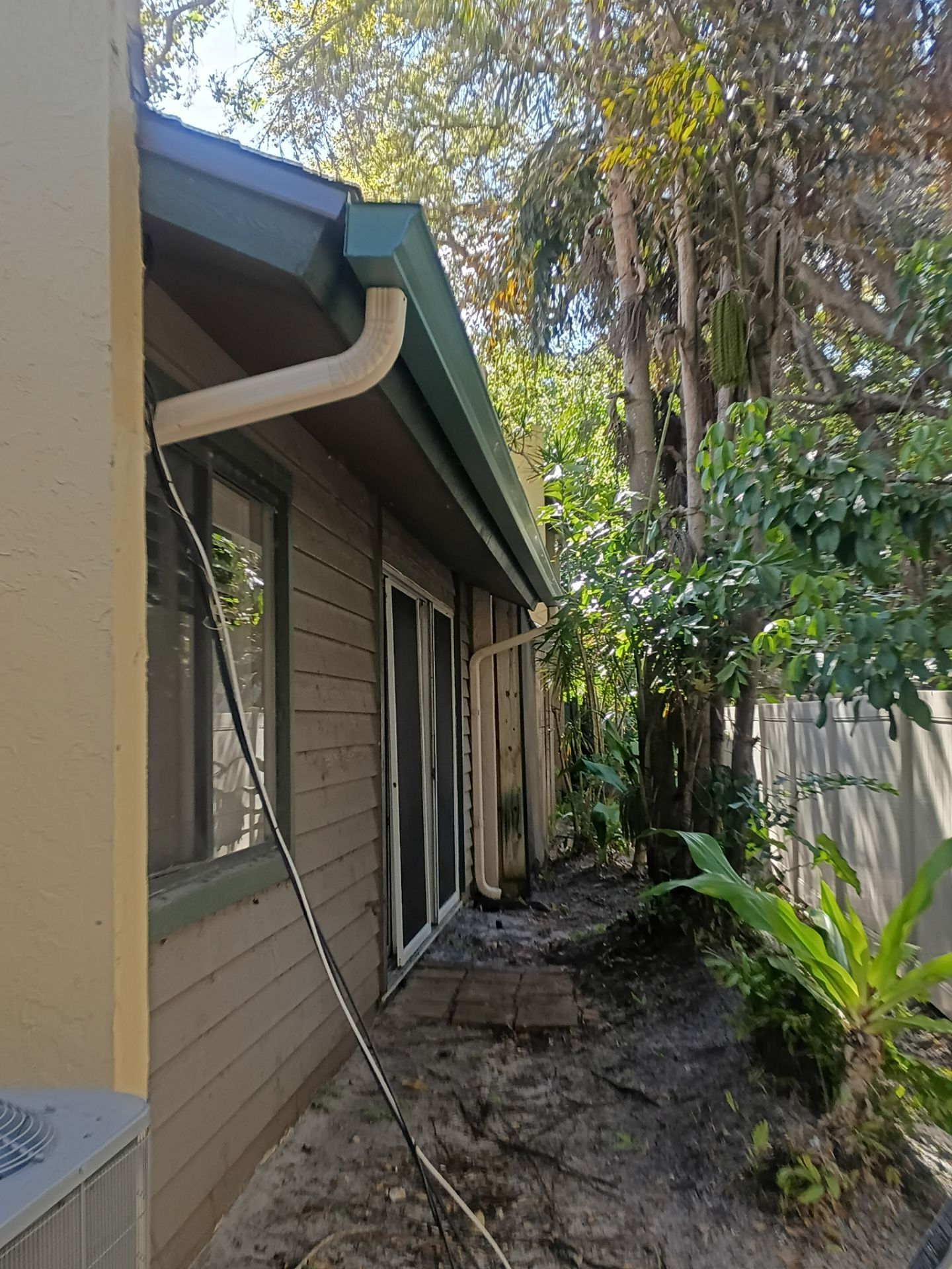 Leaf Guard using Gutter Guards & 3X4Downspoutsts in Sarasota FL by Gutter Professors