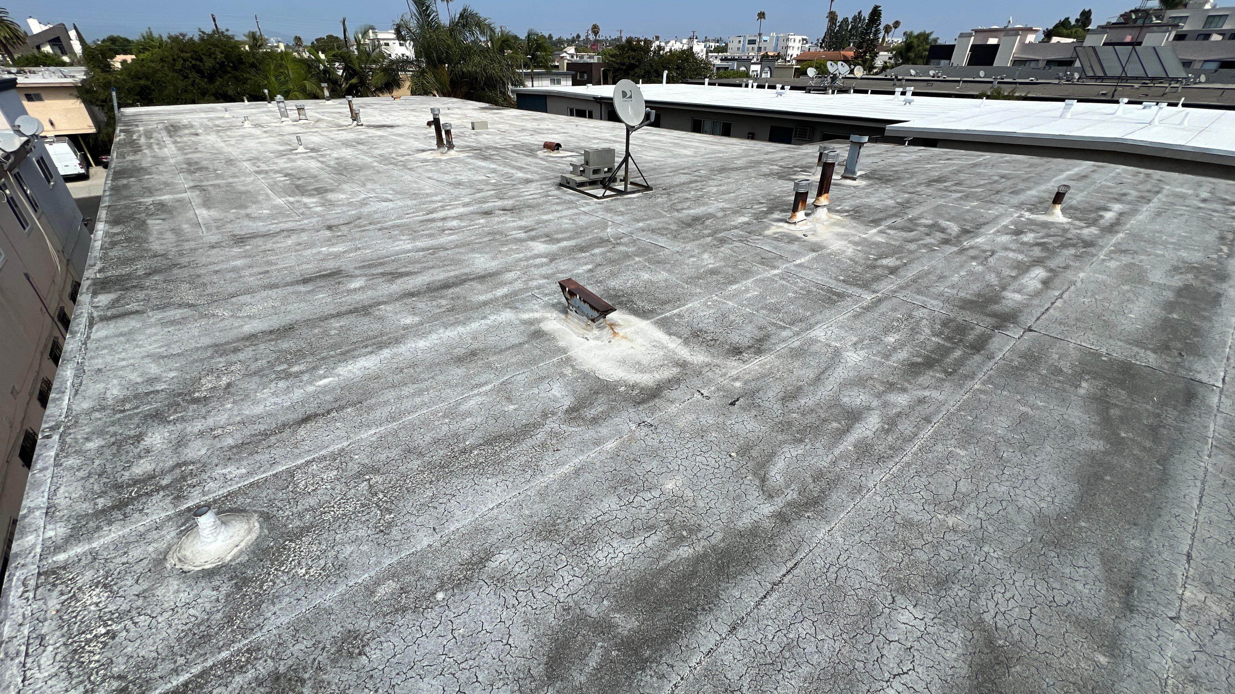 Commercial Roofing Installation using Silicone Coating by Hull Brothers Roofing