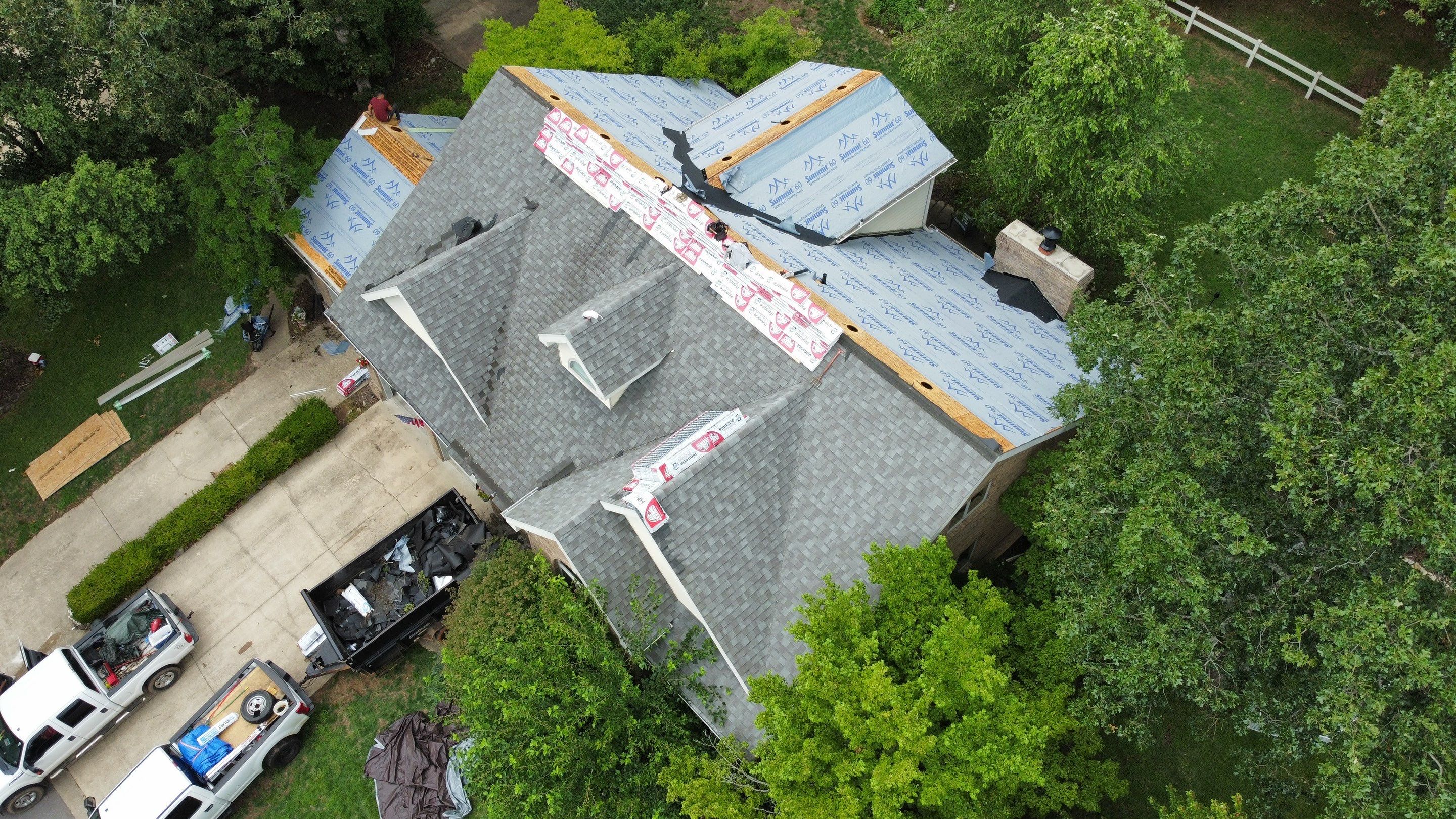 Residential Roof + Gutters & Downspouts & Gutter Guards  by Titan Commercial & Residential Roofing 