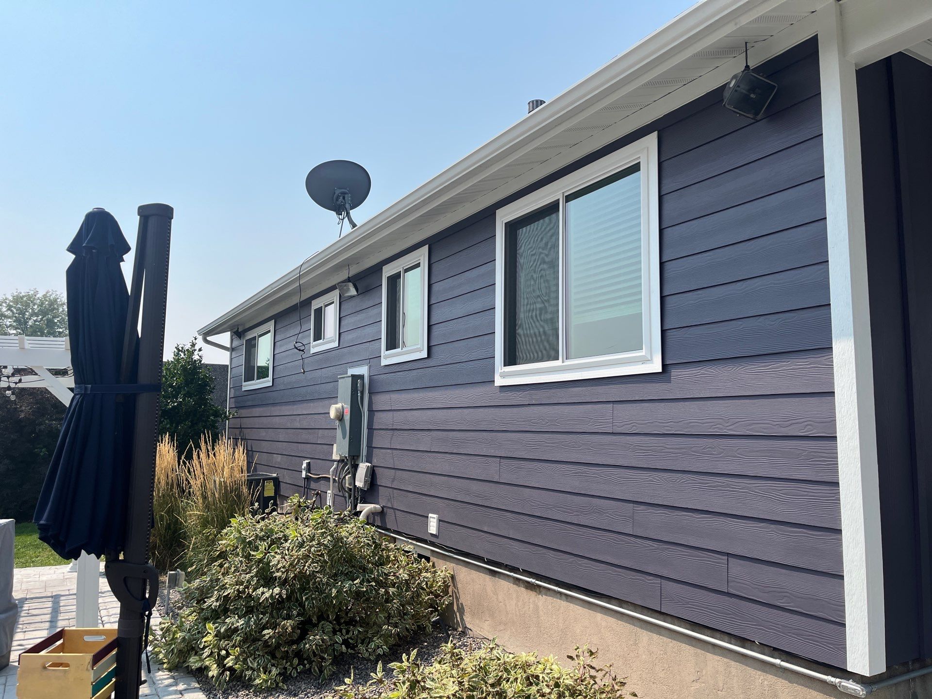 West Jordan | Custom Painted Hardie Upgrade | SW Midnight & Arctic White by Ideal Siding Utah