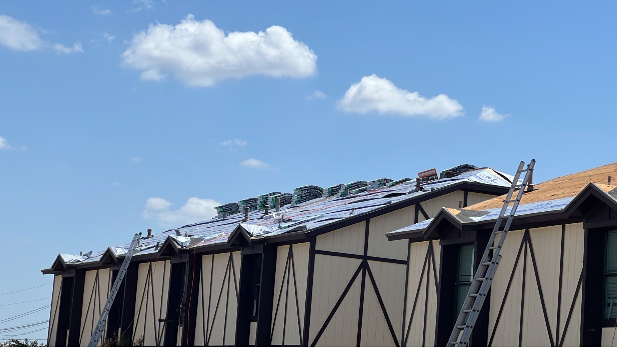 Commercial Roofing Installation using ATLAS Pinnacle Pristine Shingles by Harvey Roofing & Construction