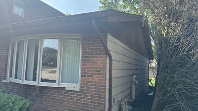 Why Lake Bluff Gutters Clog and Ice Up
