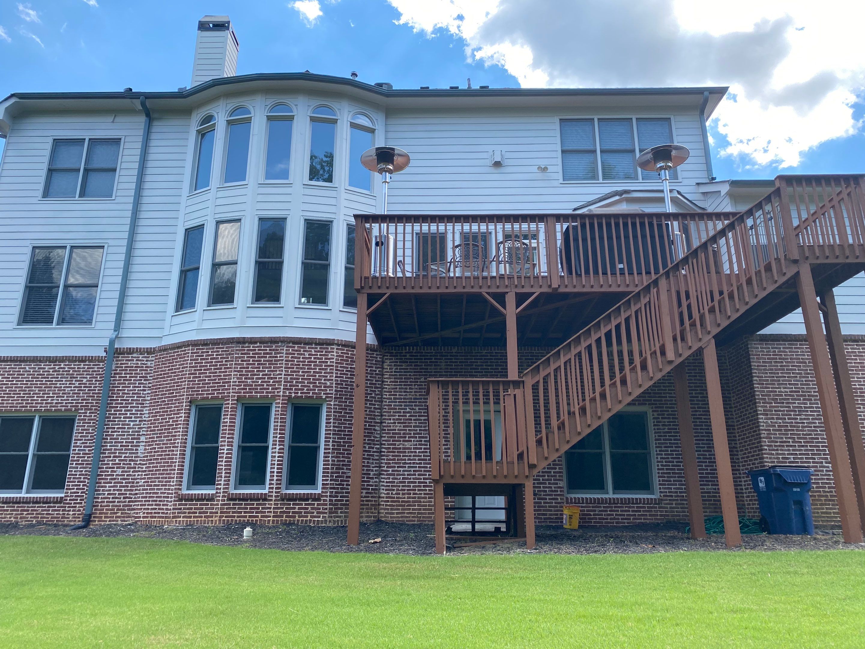 Exterior Painting and Deck Refinishing for Dacula Residential Home by Swift Home Renovations