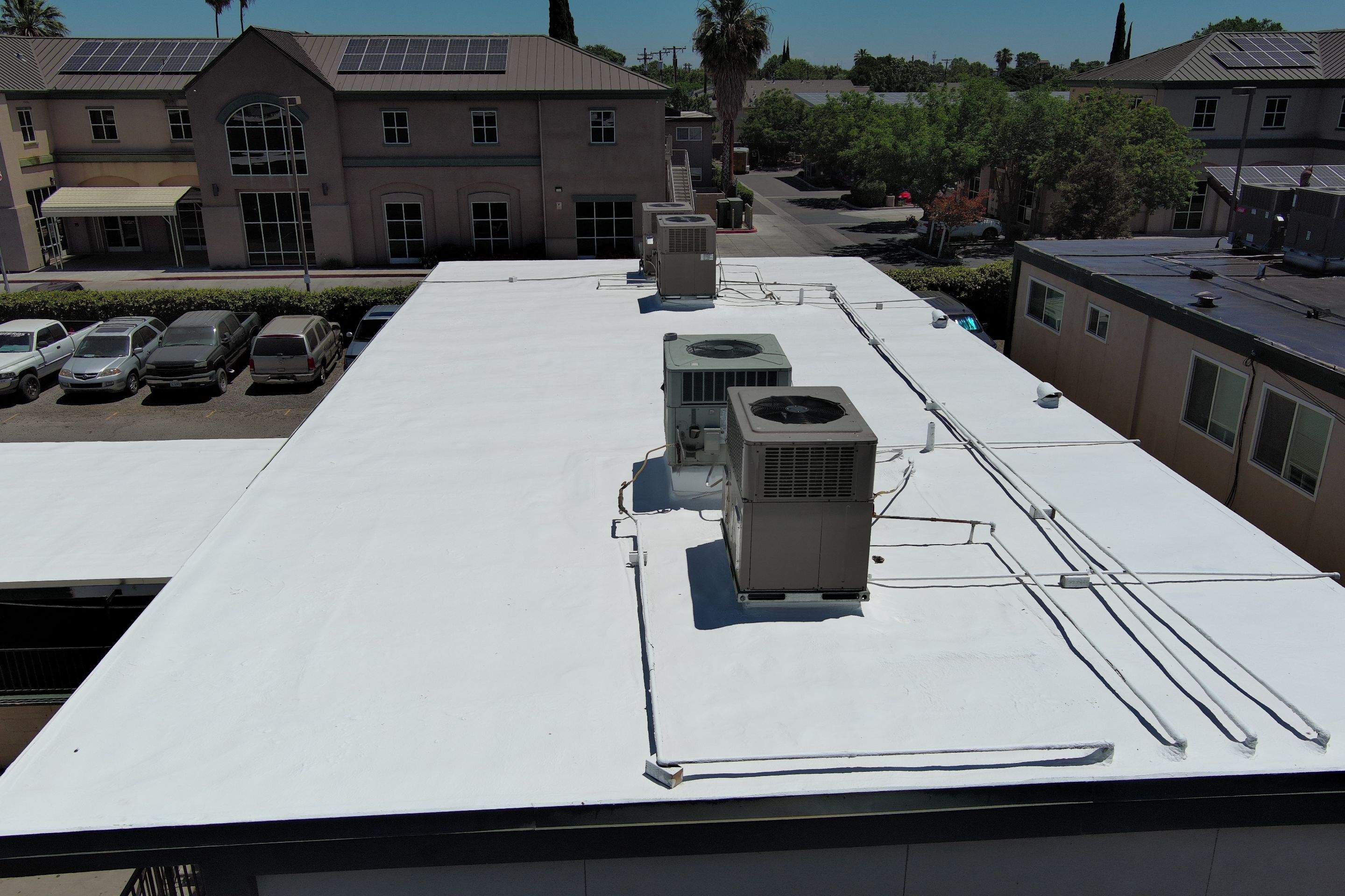 Foam Refurbish using General Coatings acrylic coatings and spray foam by Straight Edge Roofing Inc