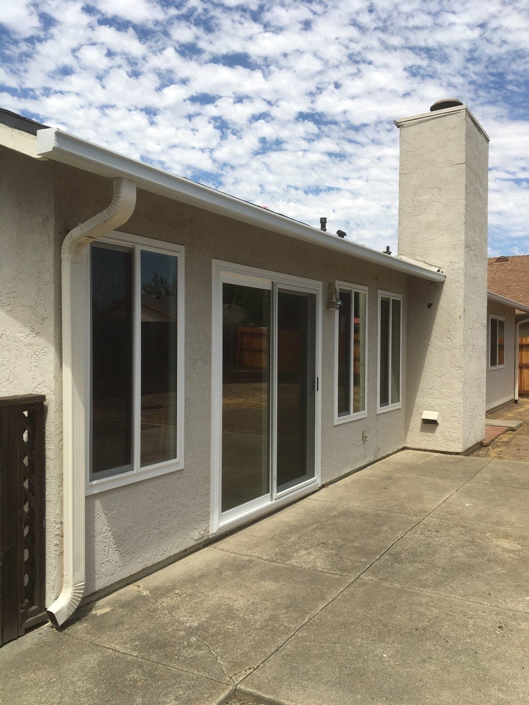 New Roof and Gutters adds value to this home by Byers Enterprises 