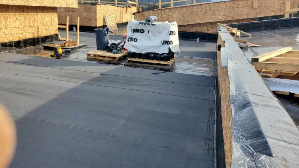 Commercial Roofing Installation using IKO 2ply sbs  by Top Notch Roofing Inc