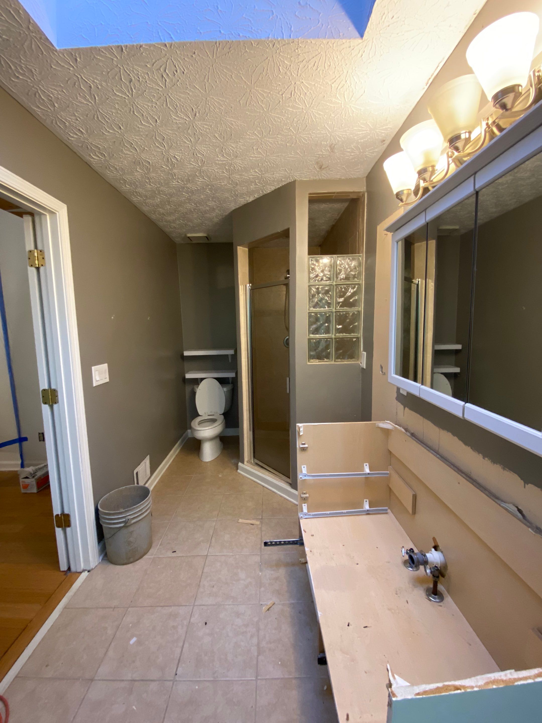 Luxury Bathroom Remodel with Marble Tiles in Kennesaw by Swift Home Renovations 