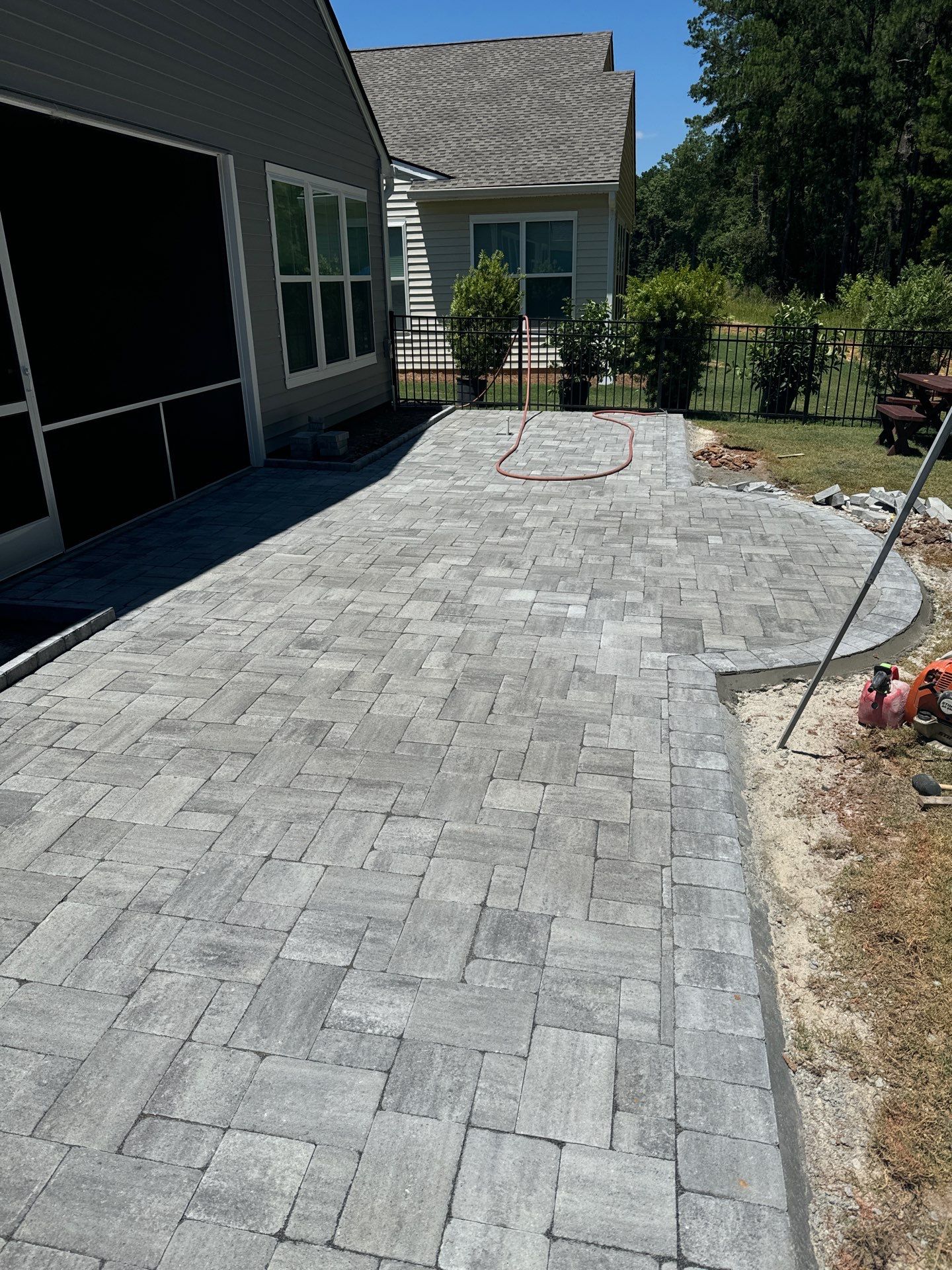 Custom Gray Stone Paver Patio Installation in Bluffton by Lowcountry Scapes, LLC