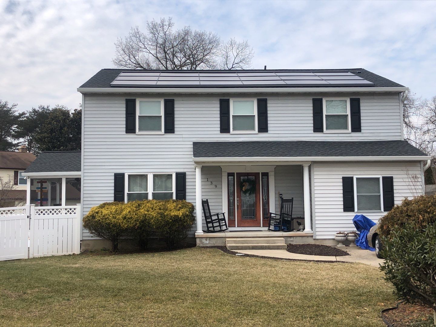Roof Replacement with GAF Decotech integrated solar panels by American Home Contractors