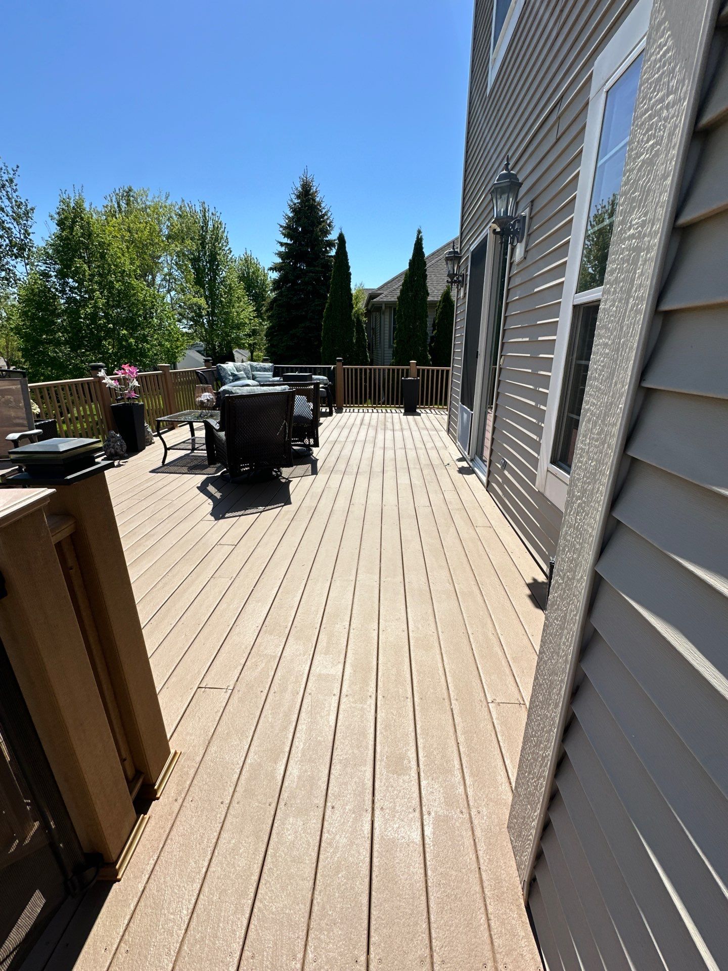 Elevated Wood Deck Refinishing and Railing Restoration in Waukesha by OCS Contracting Services