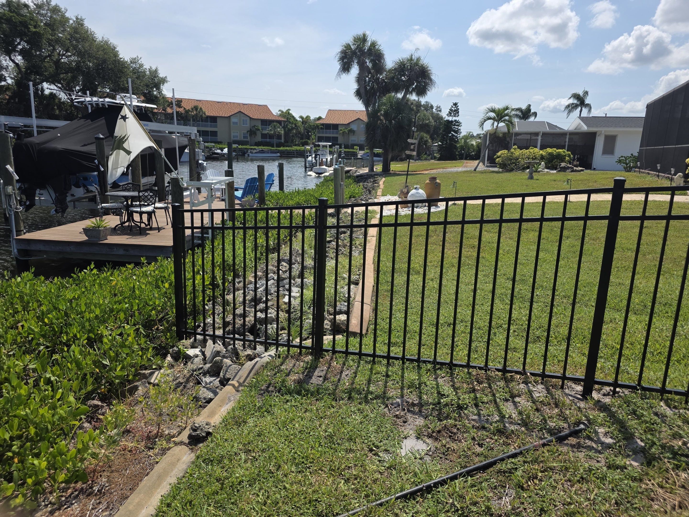 Black Aluminum Waterfront Fence Installation in Osprey by True Fence LLC