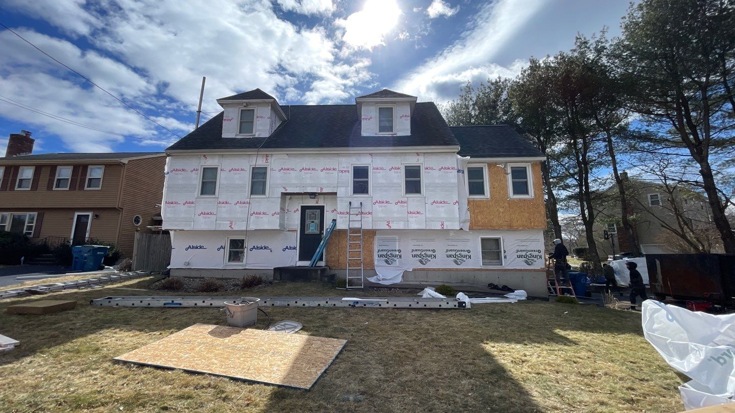 Complete Exterior Renovation with New Siding & Gutters   by Sensible Home Solutions