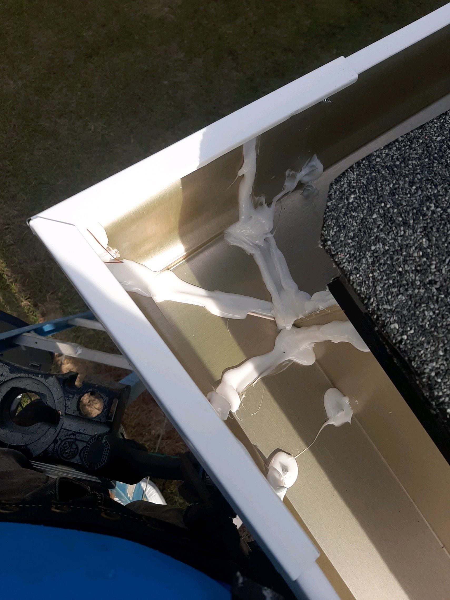 Seamless Gutter Installation Using White K-Style Gutters by Gutter Professors