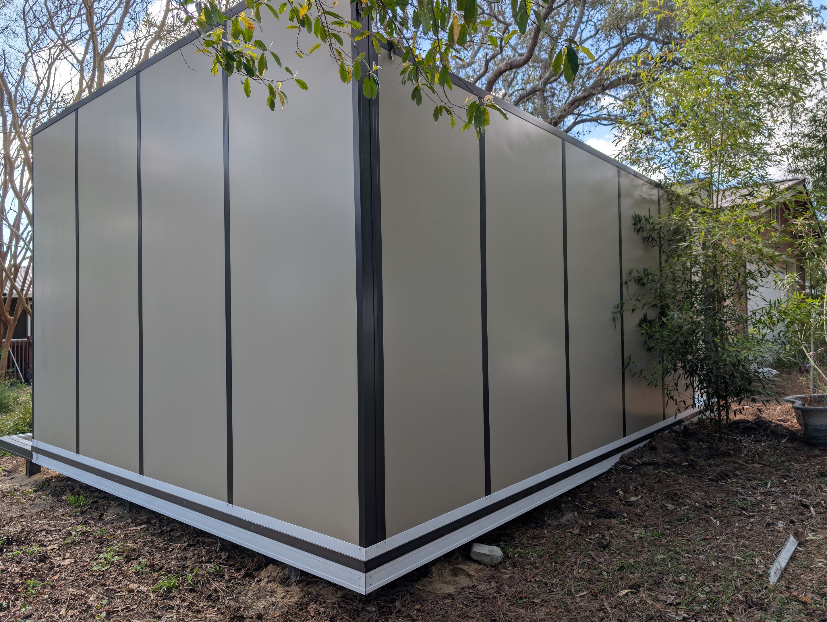 Titan Blockhouse Backyard Home Addition by Titan Sunrooms