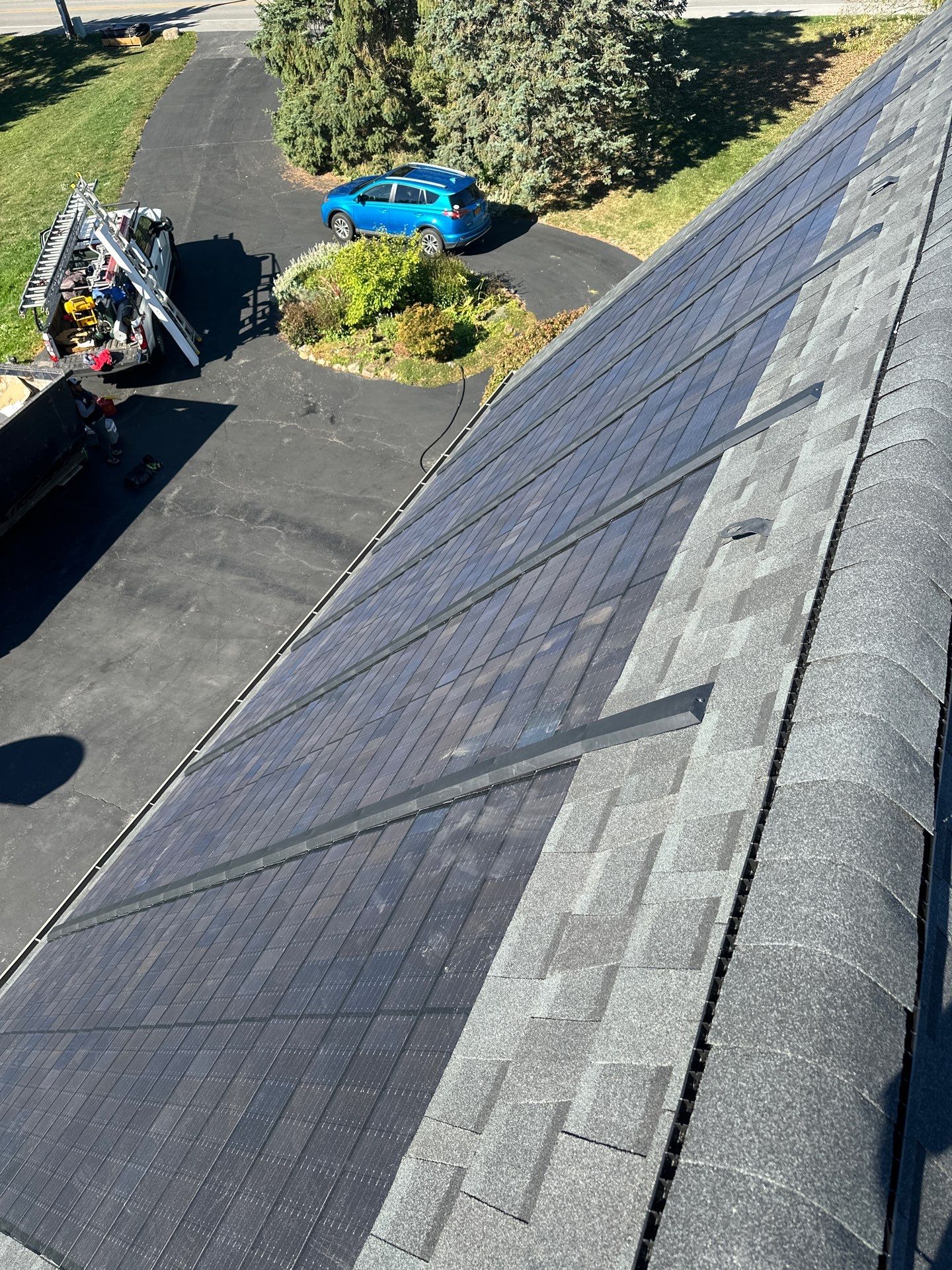 GAF Timberline Solar Roof Installation in Pittsford, NY by American Home Contractors