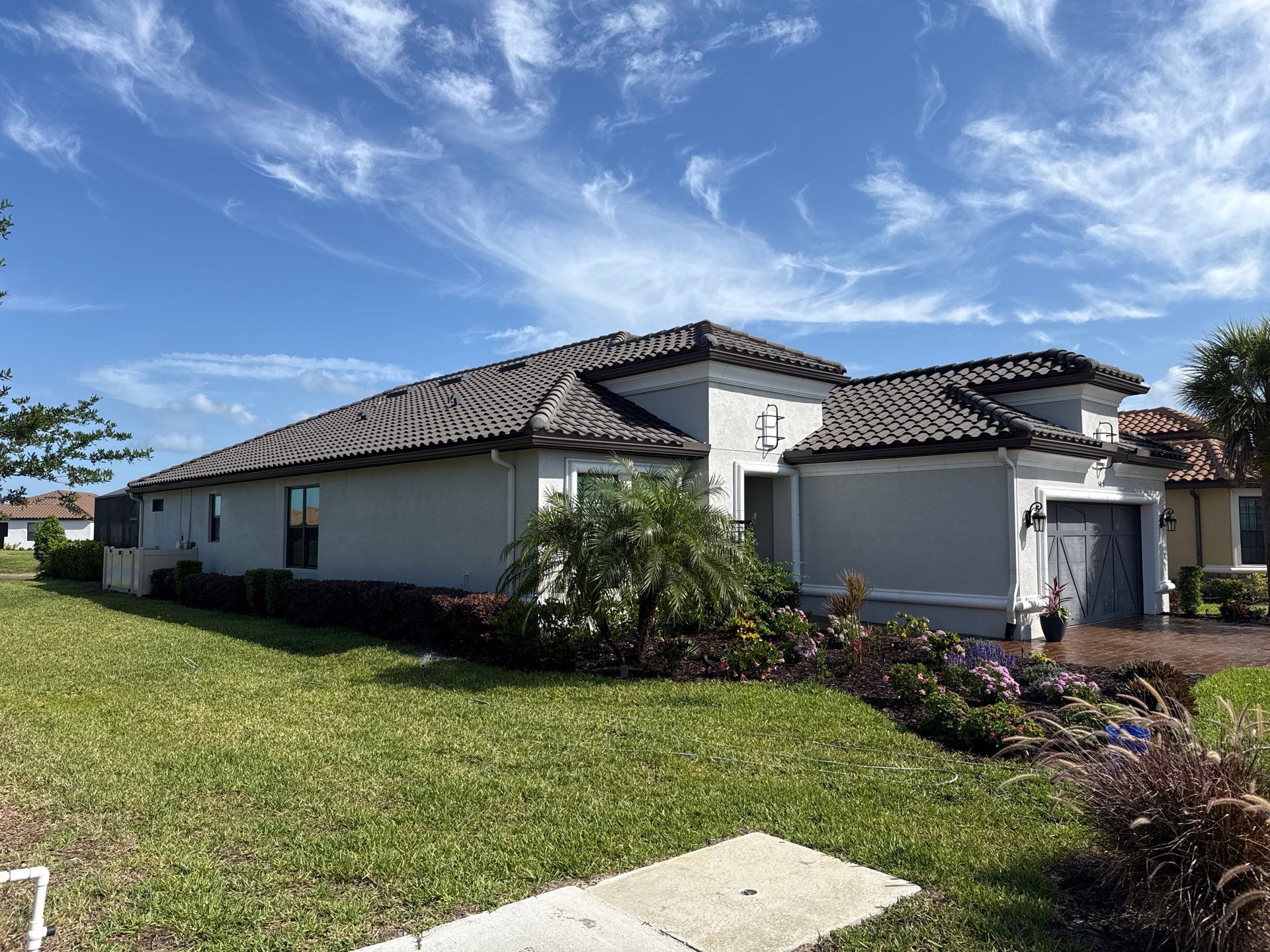Barrel Tile Roof Cleaning in Artisan Lakes, Palmetto, FL | No Roof Walking on Roof by Sunshine AquaWash