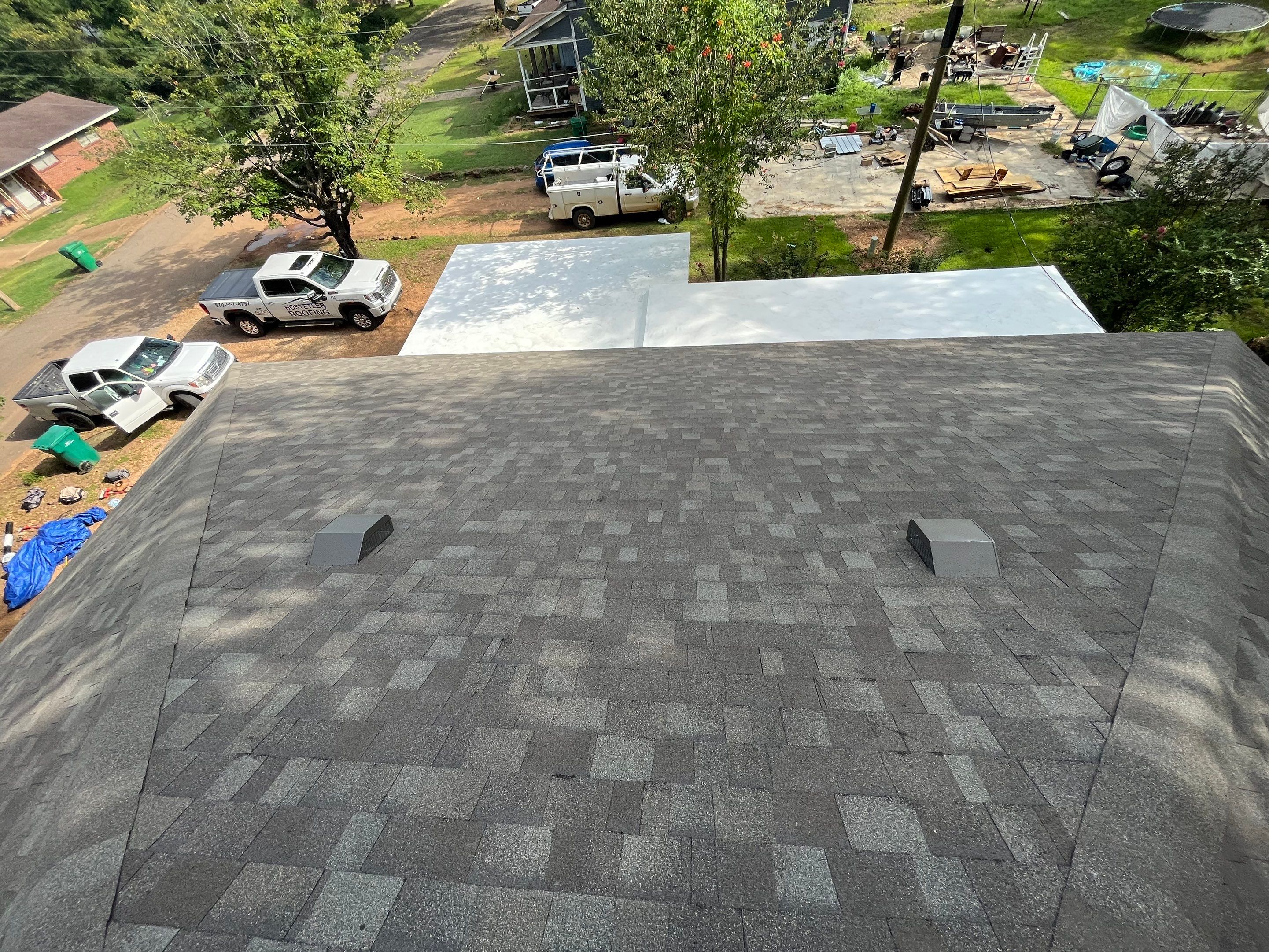 Storm Restoration Reroof: 30 Year Architectural Shingle by Hostetler Roofing