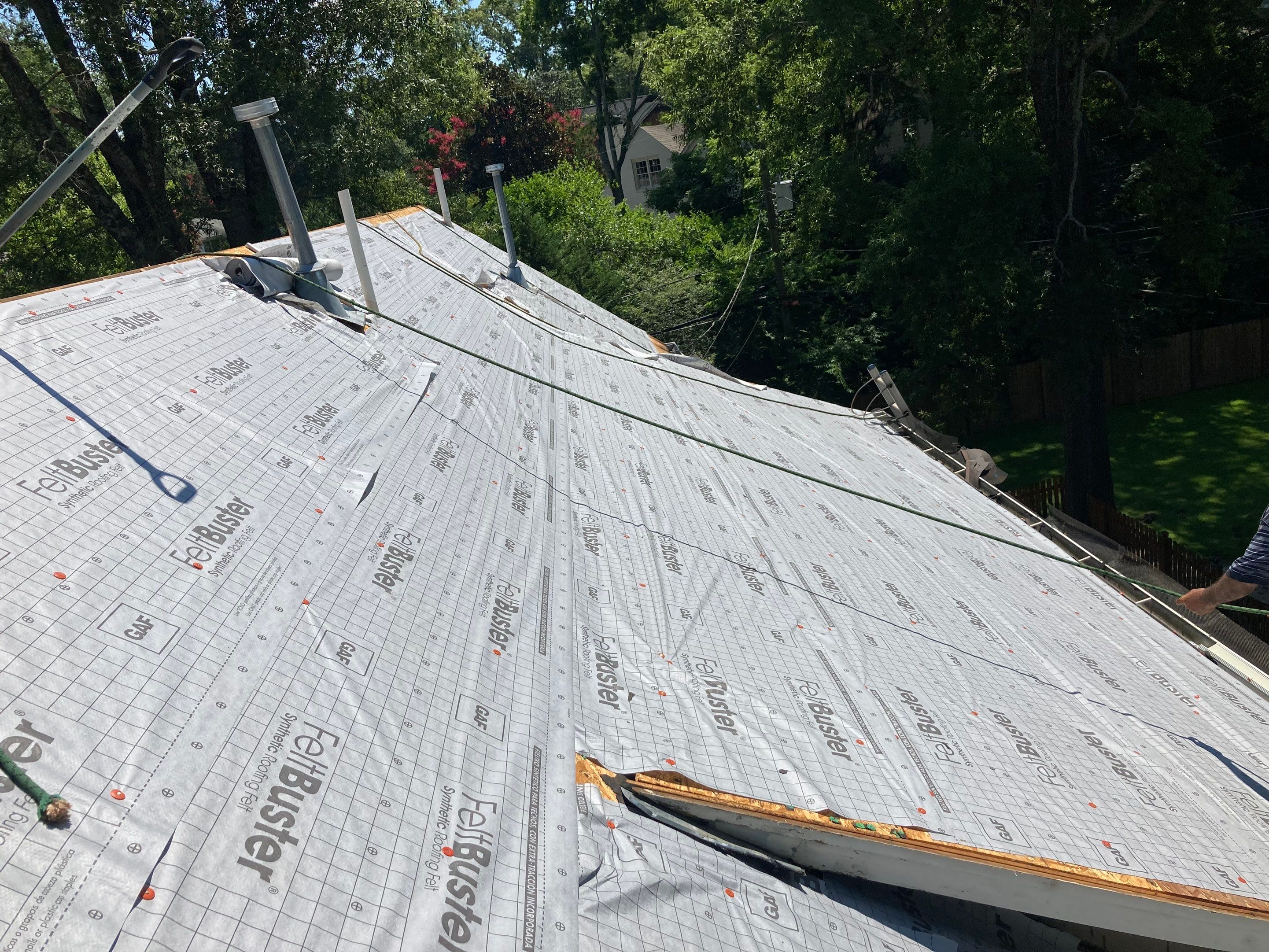 Residential Roofing Installation using Architectural Shingles by The Roofing Dudes