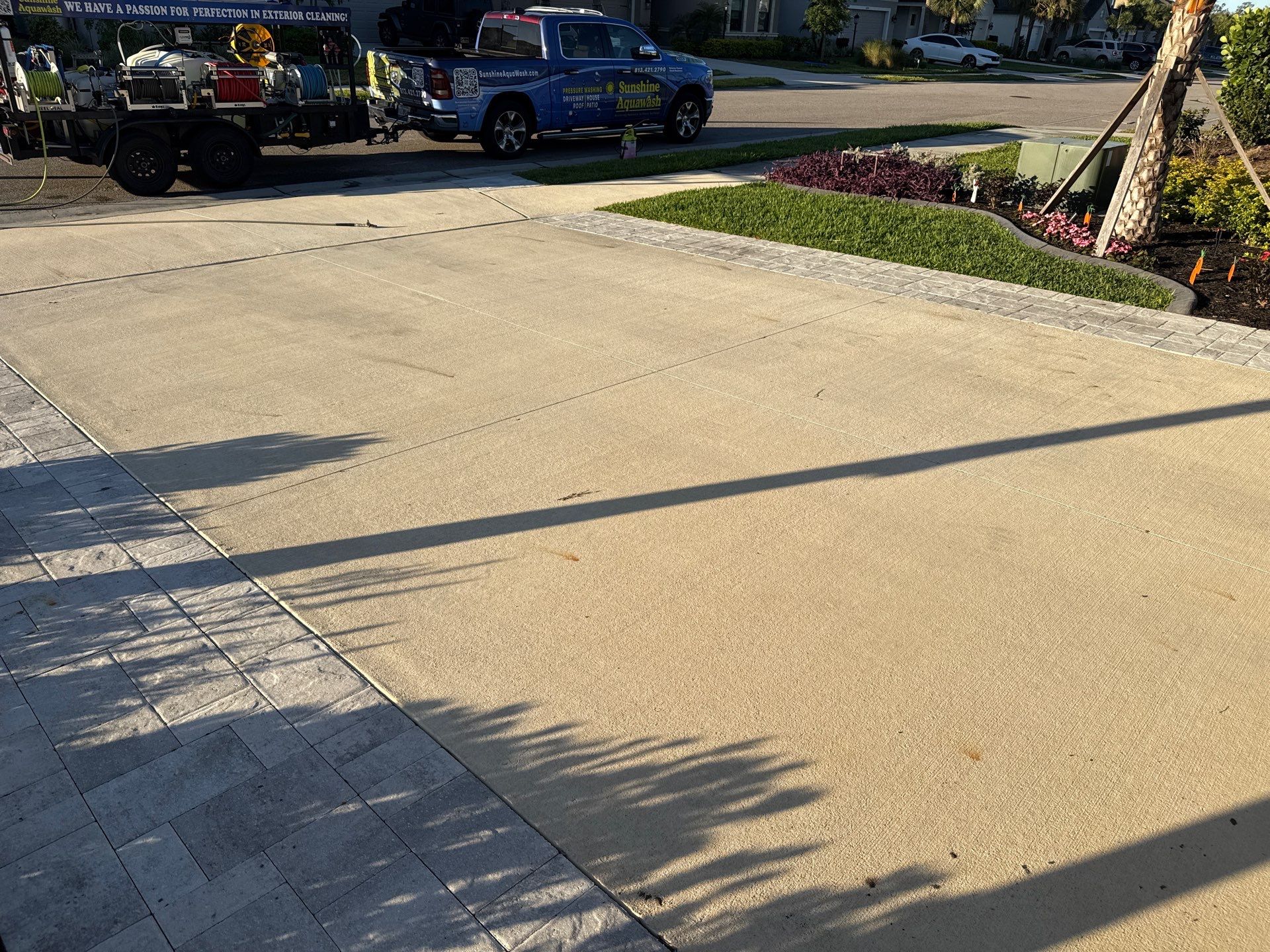 Rust Stain Removal from Concrete Driveway and Pavers in Park East at Azario | Lakewood Ranch, FL by Sunshine AquaWash