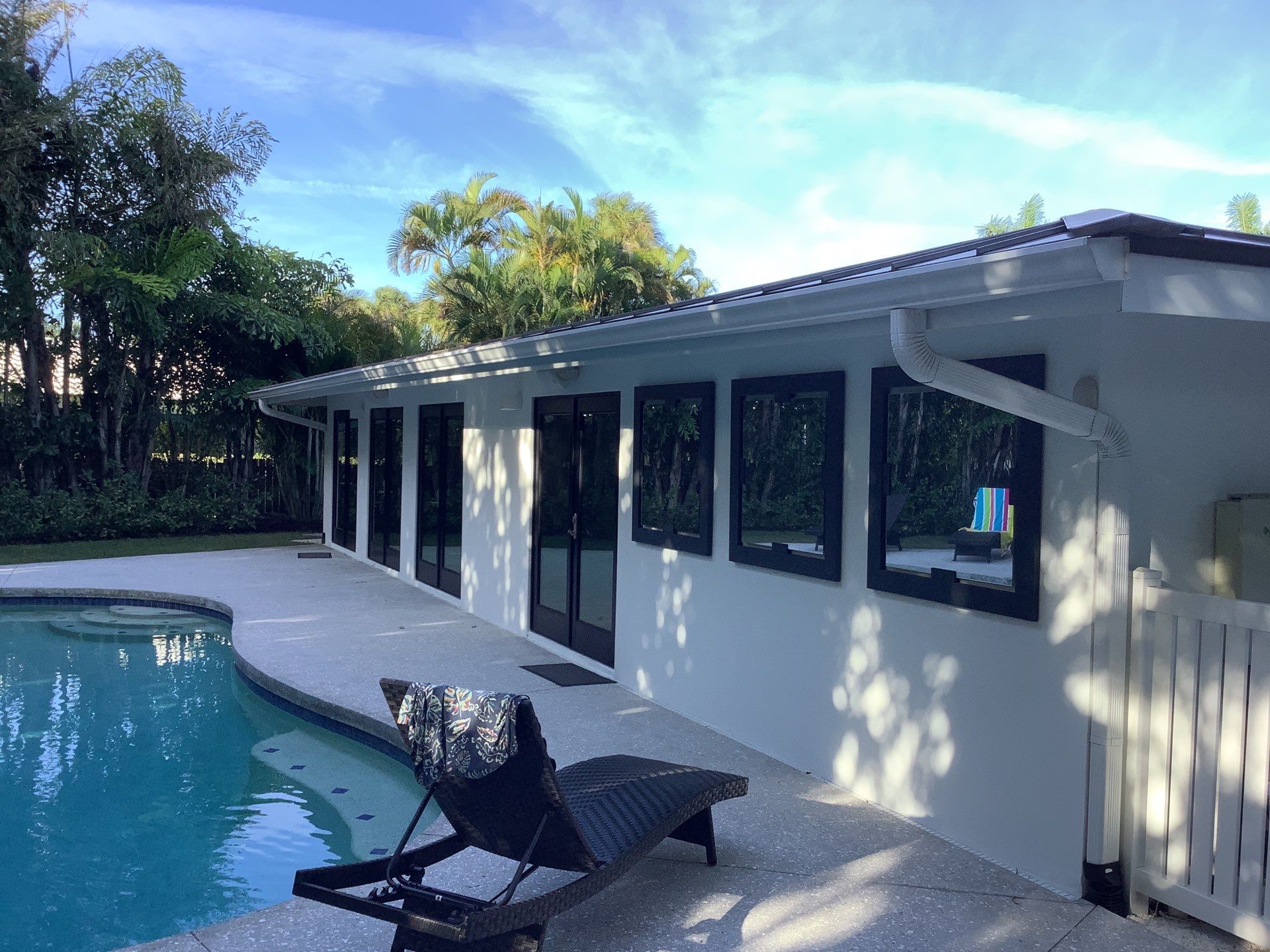 White Seamless Gutters and Downspouts in Sarasota FL by Gutter Professors