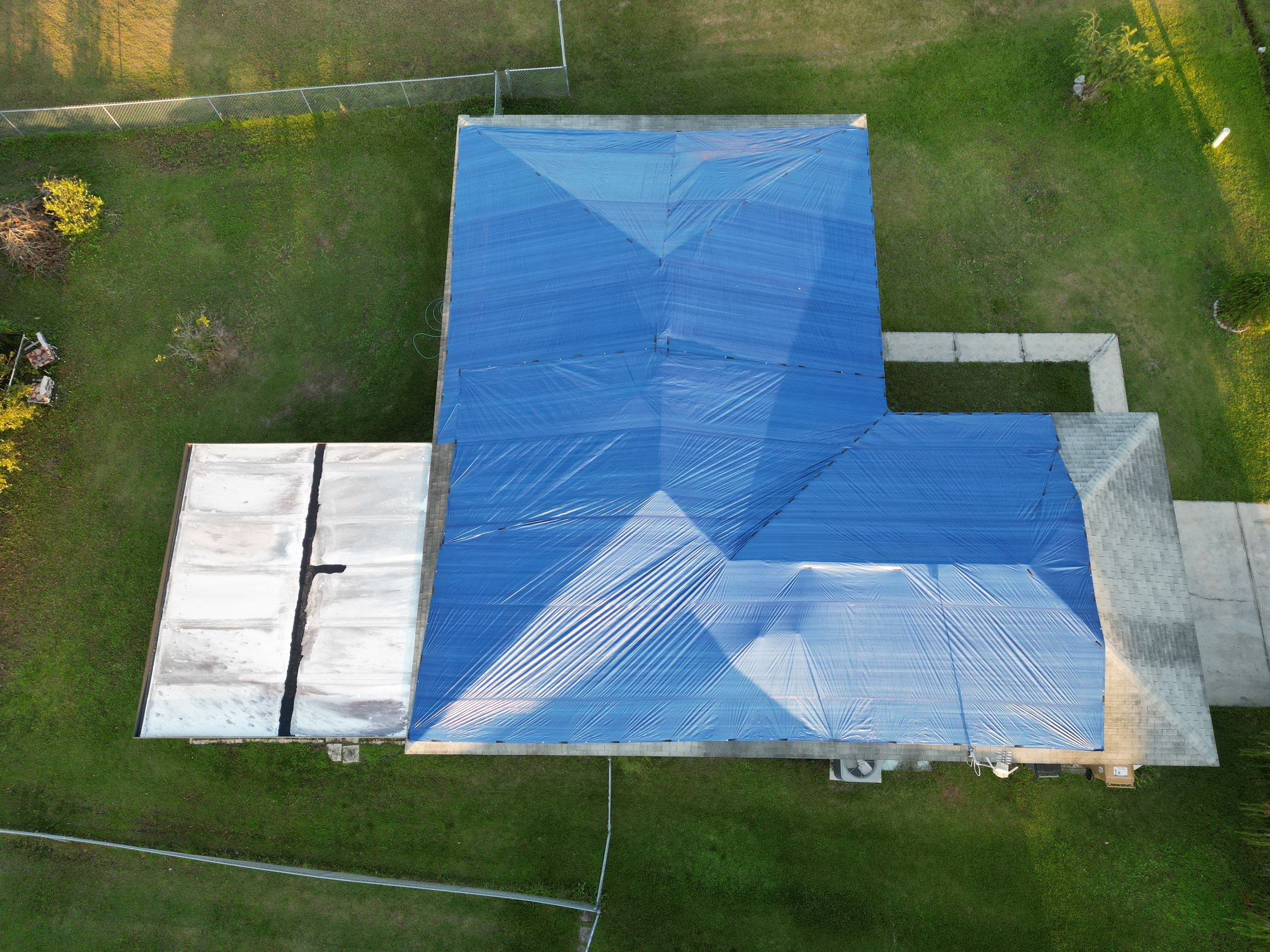 Tarp using TARP BLUE by AquaShield Restoration USA