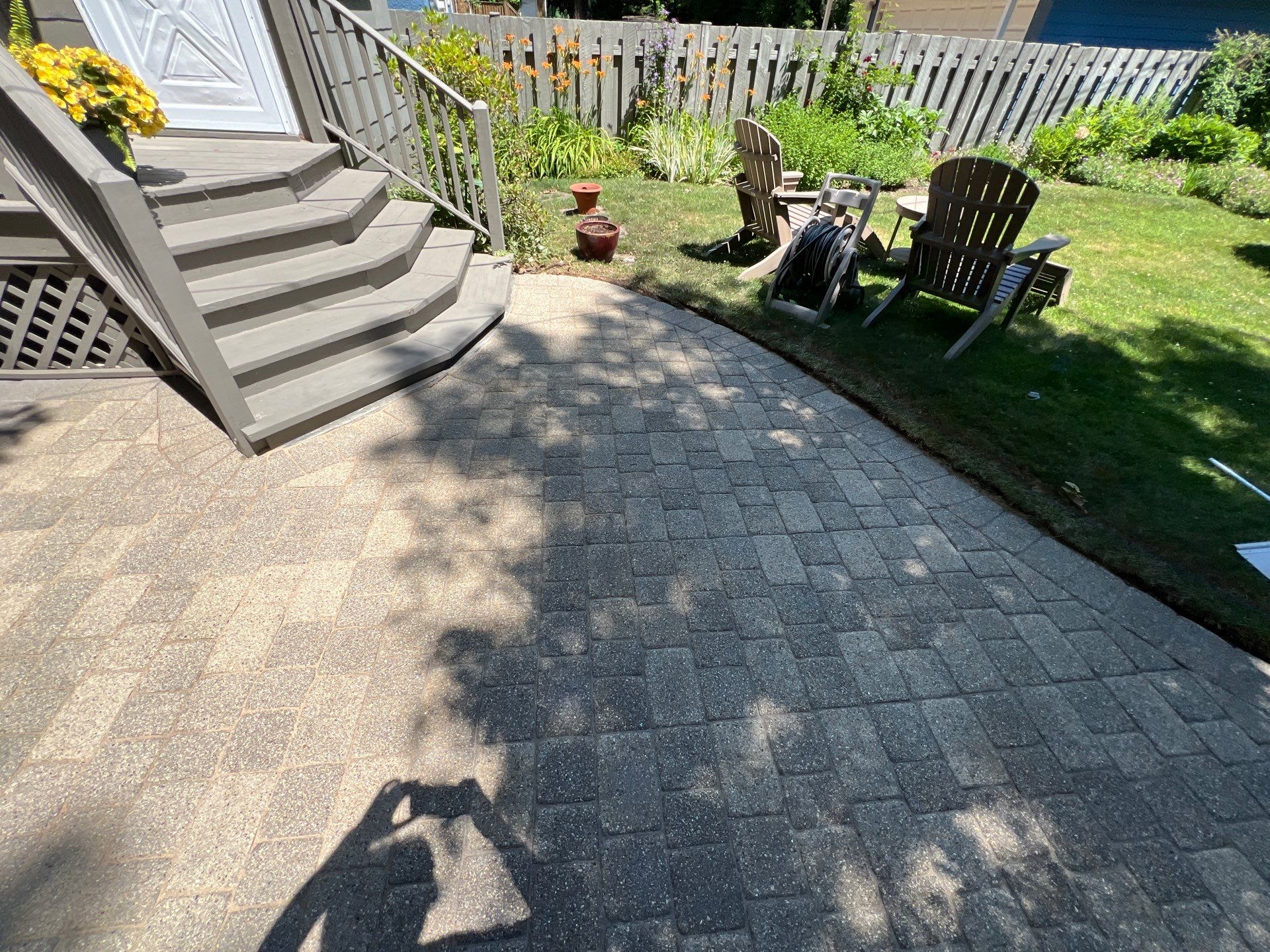 Brick paver cleaning and sealing by Northern Power Washing LLC.
