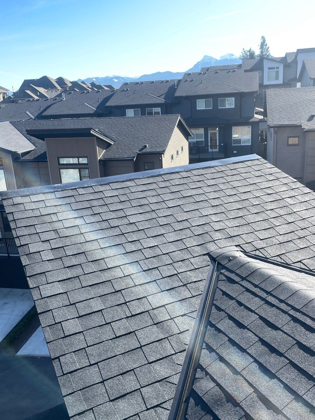 Residential Roofing Installation using OC Oakridge shingles by Top Notch Roofing Inc
