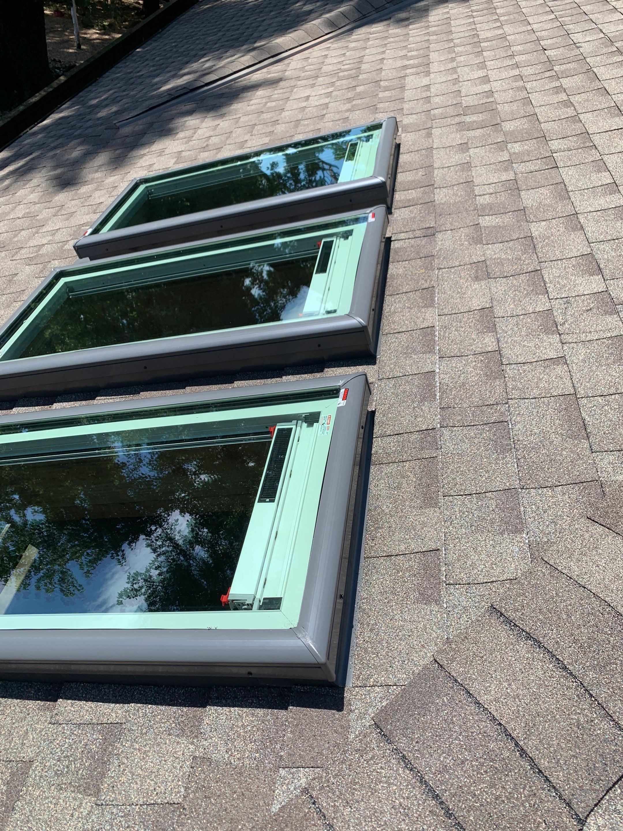 roof repair and skylight replacements in Norman by McCann's Roofing and Construction