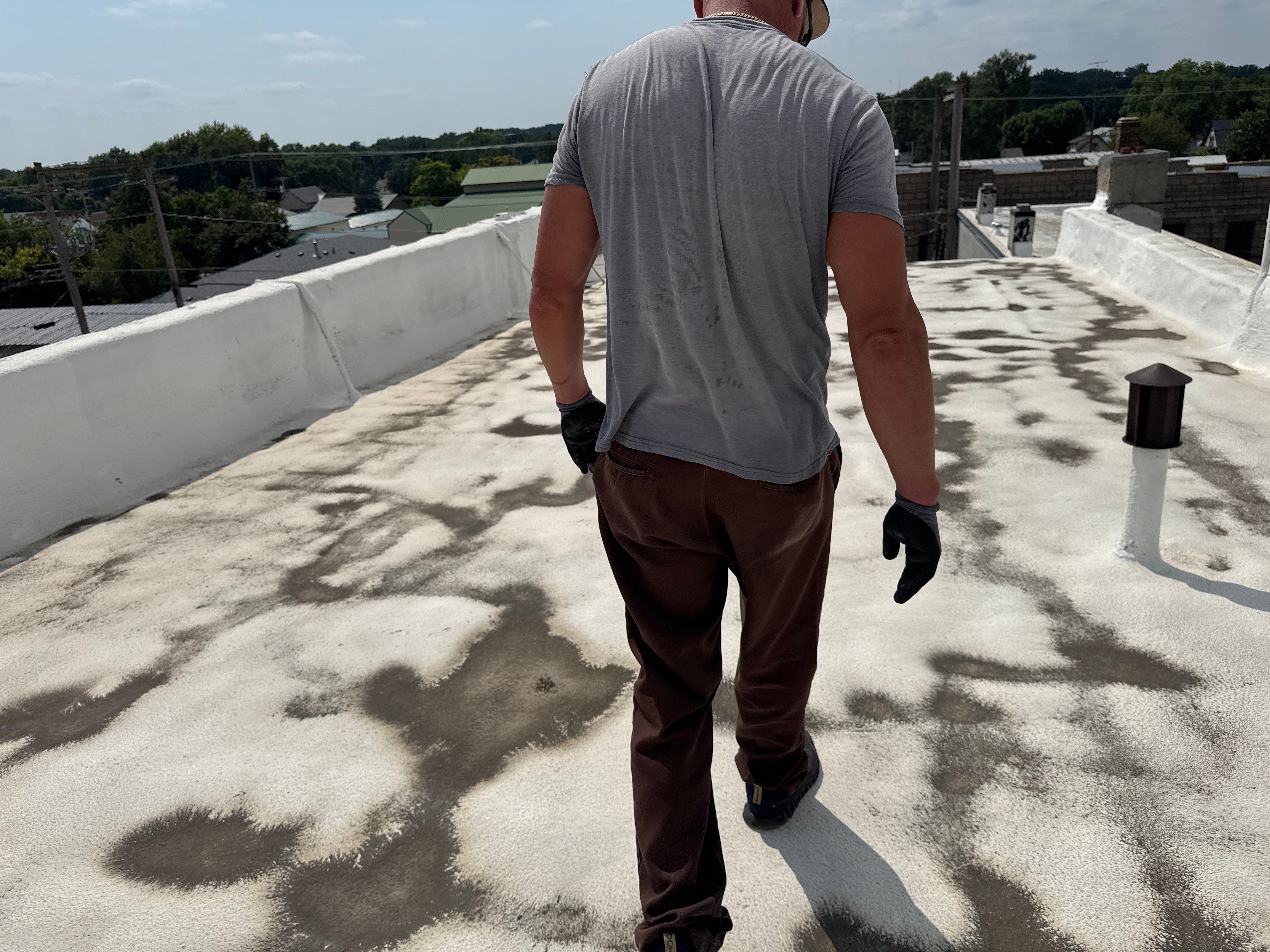 Commercial Flat Roof Elastomeric Coating and Repair in West Point by Crows Roofing LLC