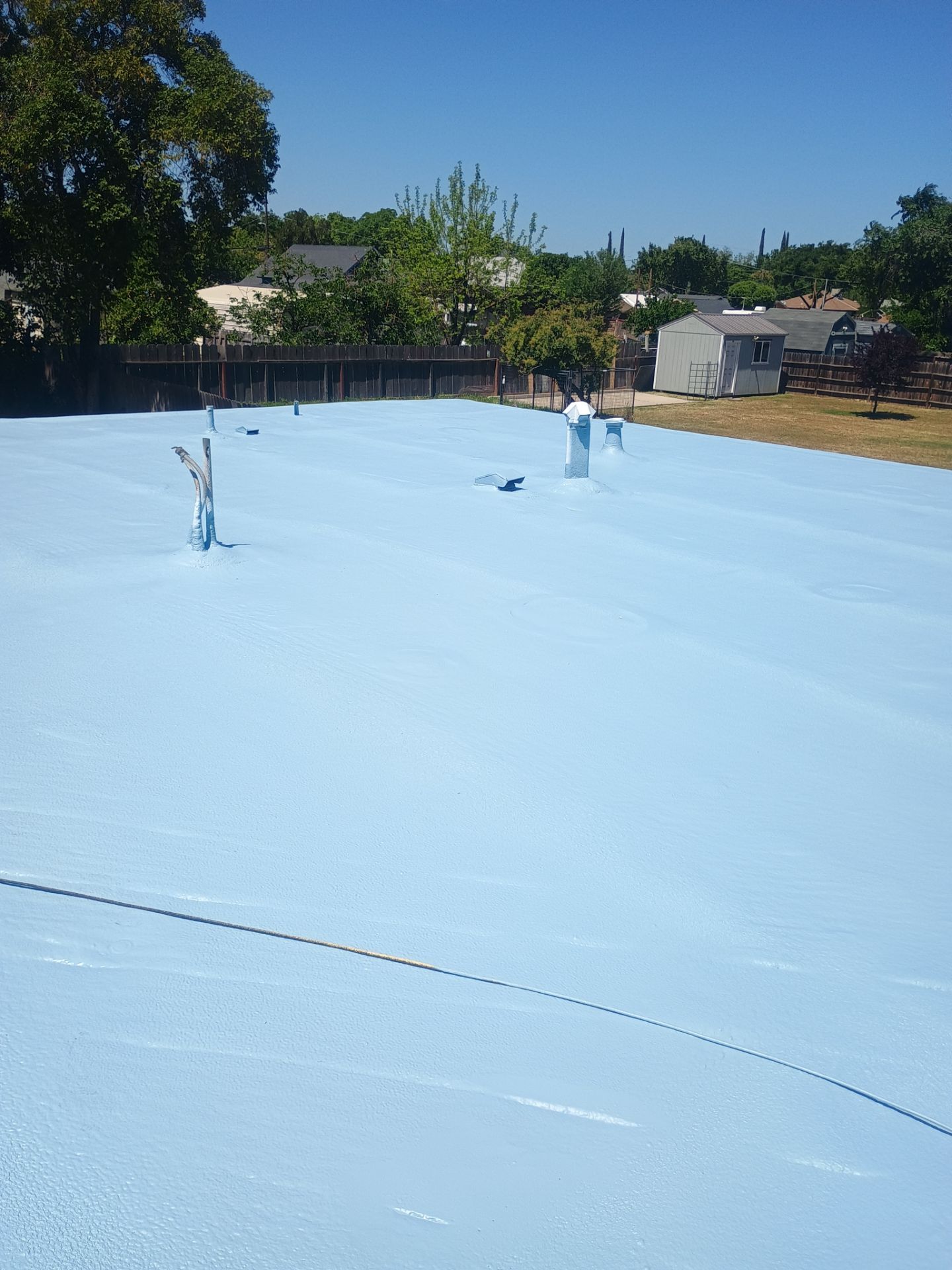 Foam Refurbish using Conklin Benchmark/PUMA XL coatings and spray foam by Straight Edge Roofing Inc