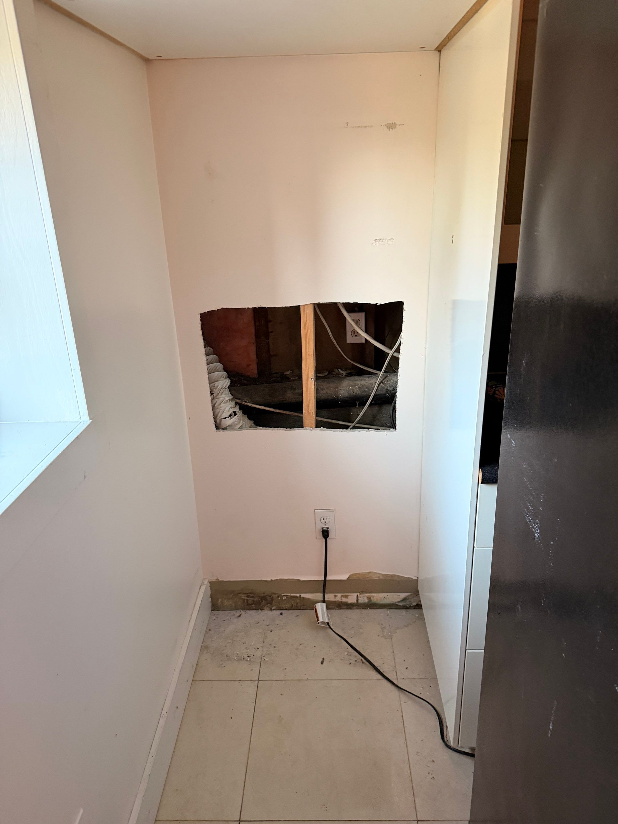 Wall Repair & Patching After Plumbing Leak Access by YVR Construction Group