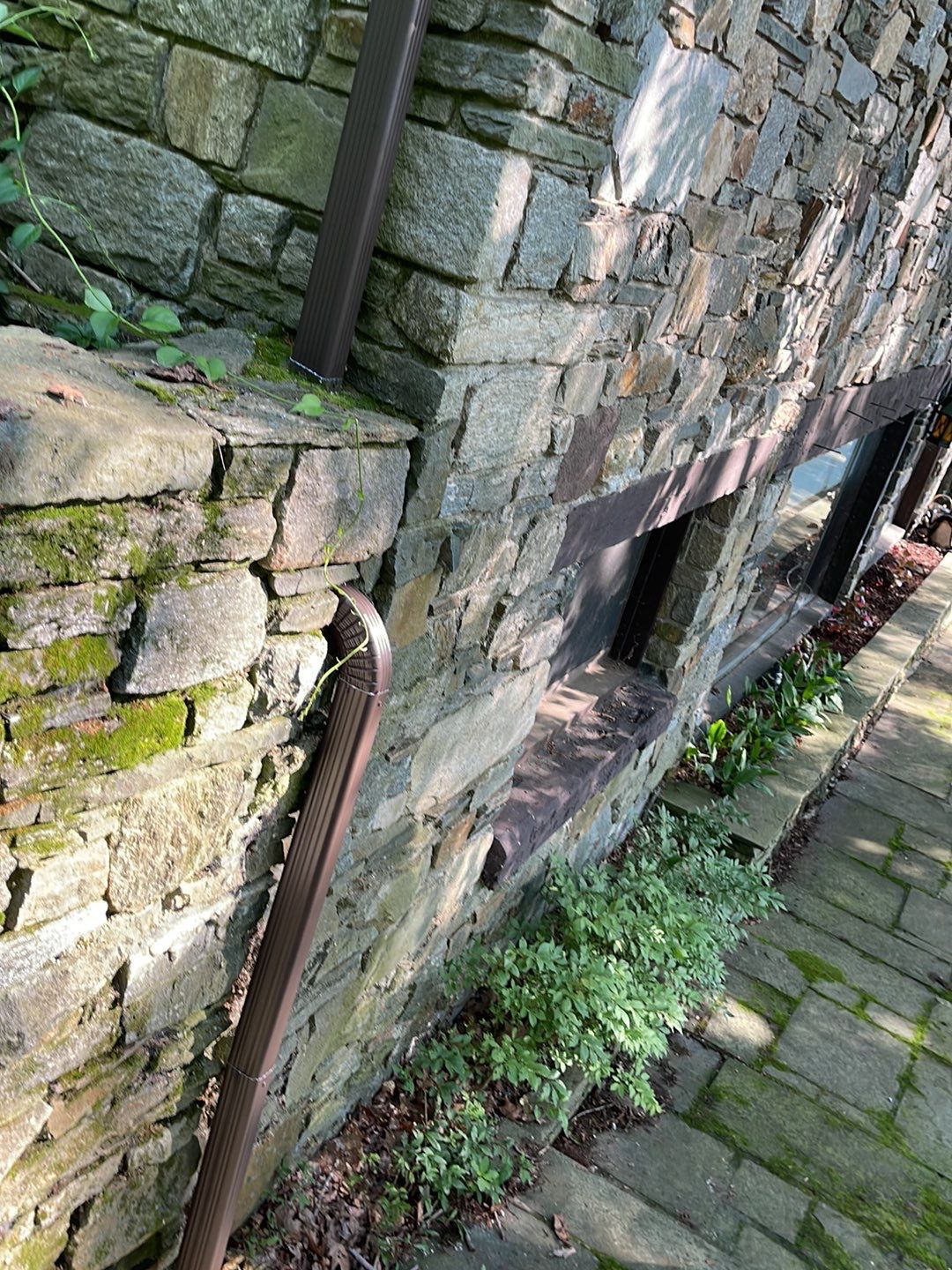 Gutter Installation using 5k Brown Gutters by A Plus Exterior