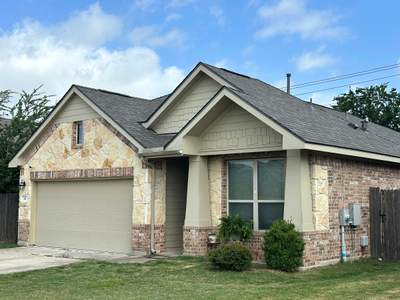 Oakridge Driftwood Roof Replacement in Buda