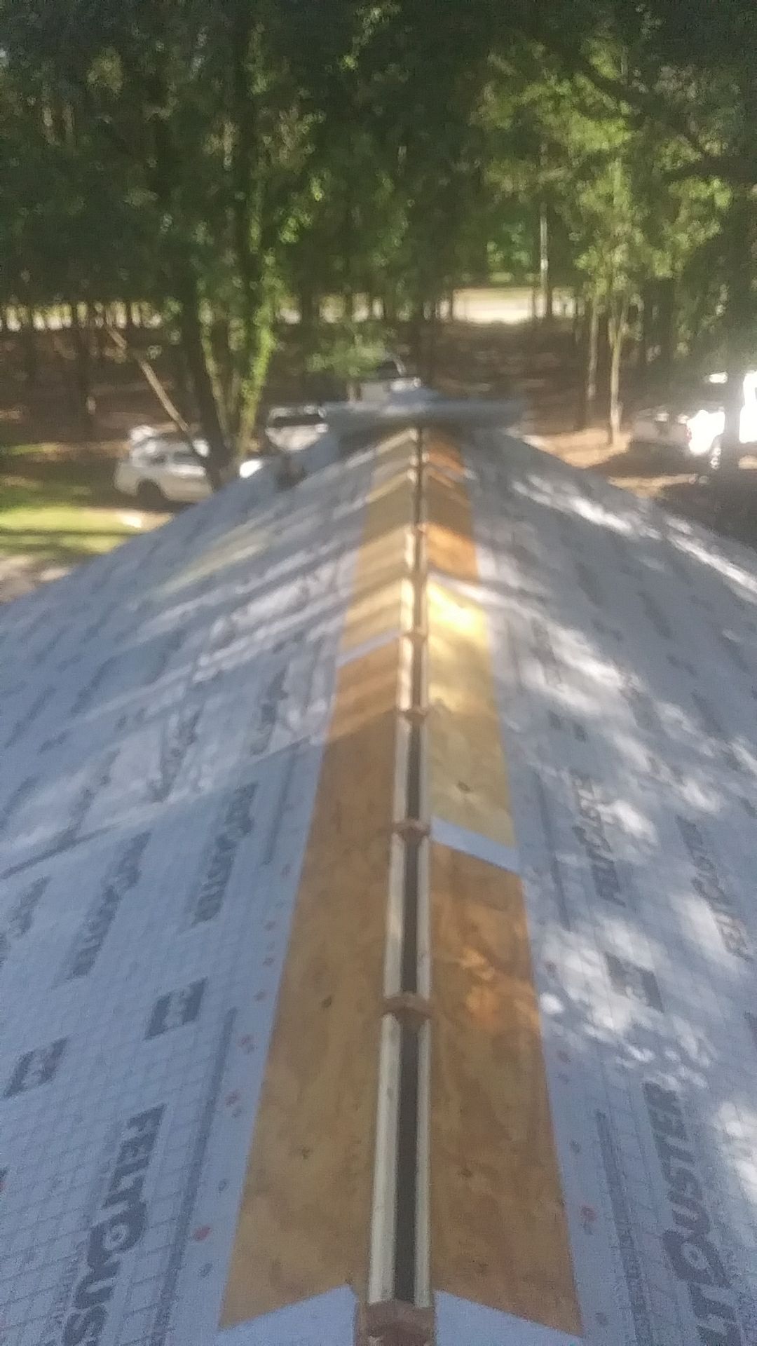 Residential Roofing Installation using Metal roofing by American Roofing & Construction LLC