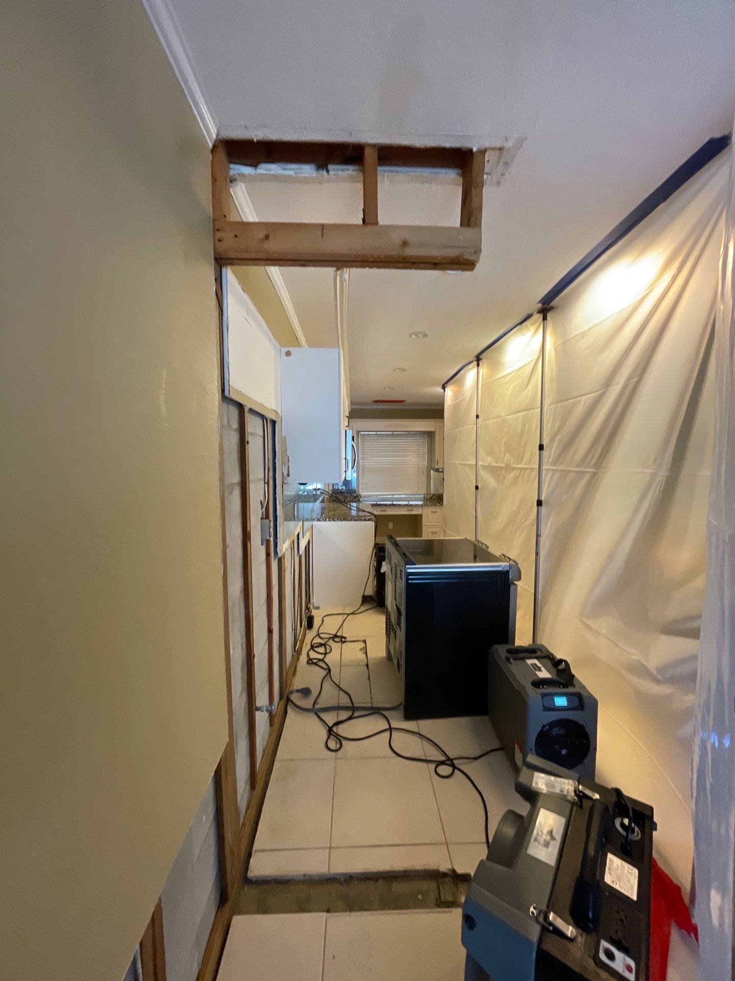 Mold remediation and rebuild of kitchen and living areas by Bay Coast Restoration 