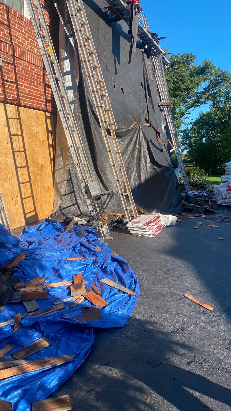 Asphalt Roof Replacement by Custom Installations