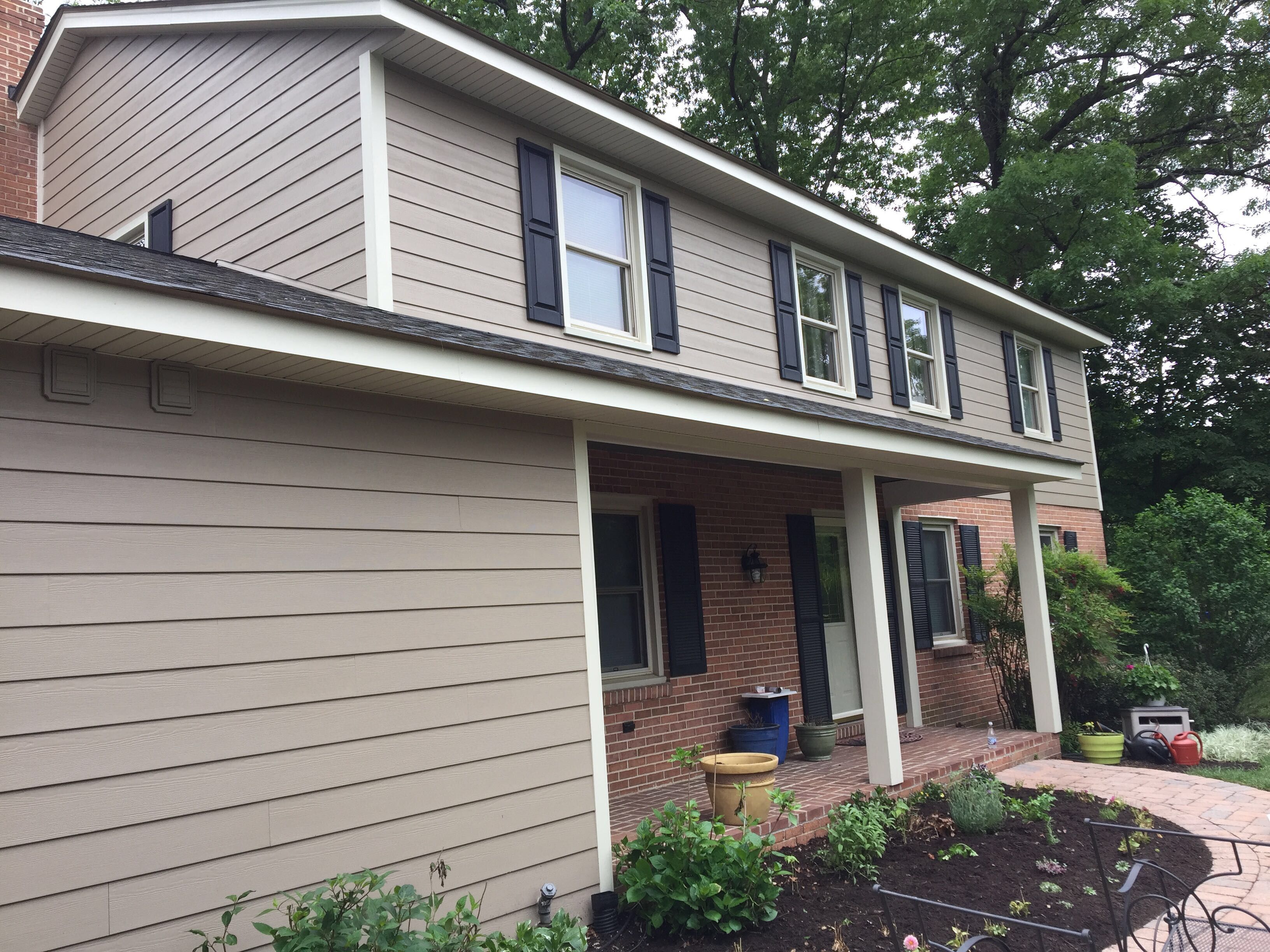 Siding and Roof Replacement by American Home Contractors