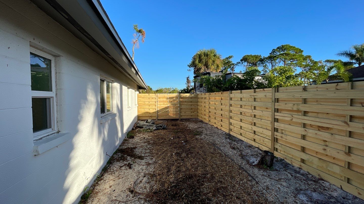 Wood Fence Installation using Horizontal Shadowbox Wood Privacy Fence by Asap fence and gates, LLC