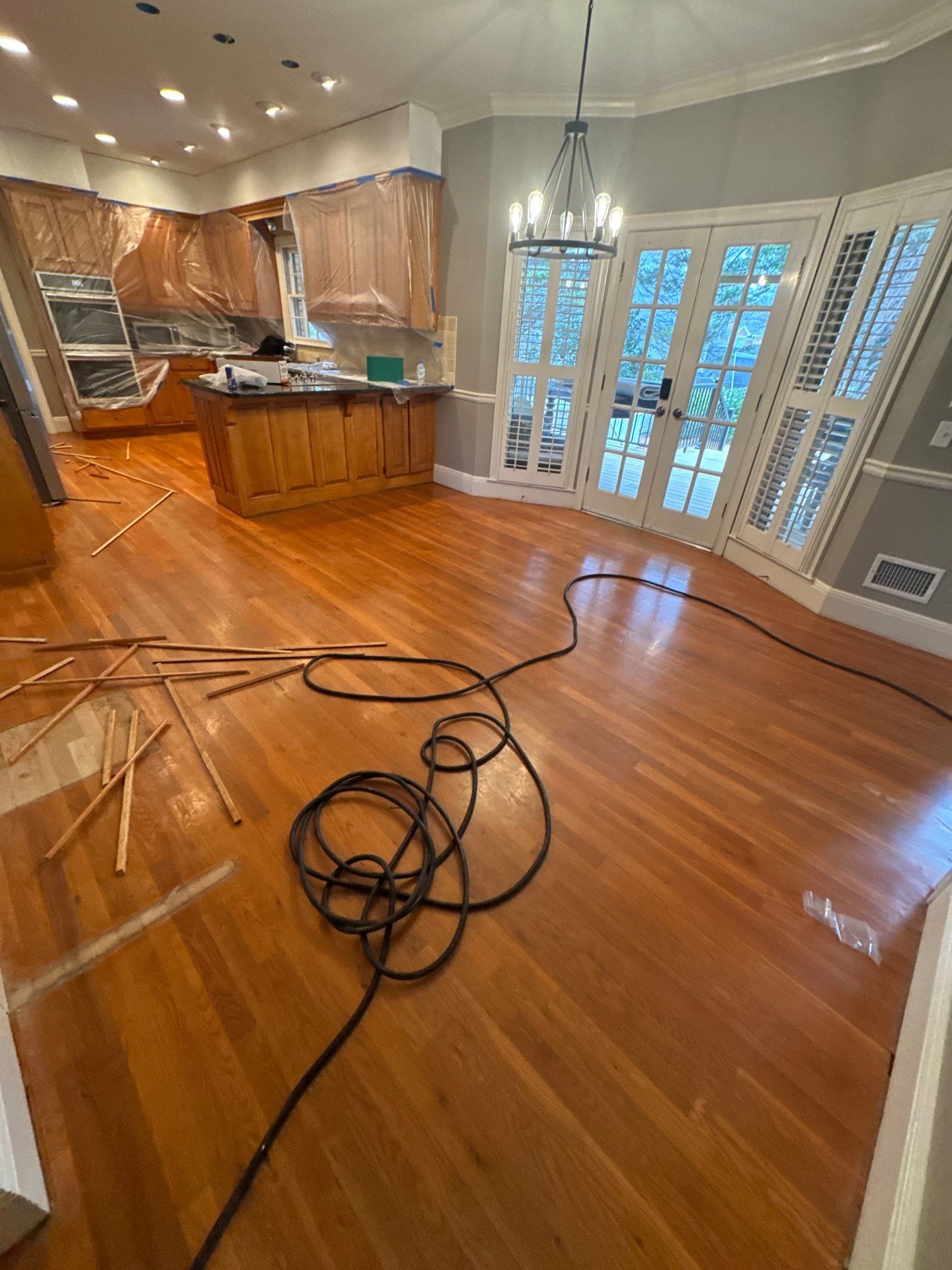 Dark Walnut Hardwood Floor Refinishing and Cabinet Painting in Atlanta by Swift Home Renovations