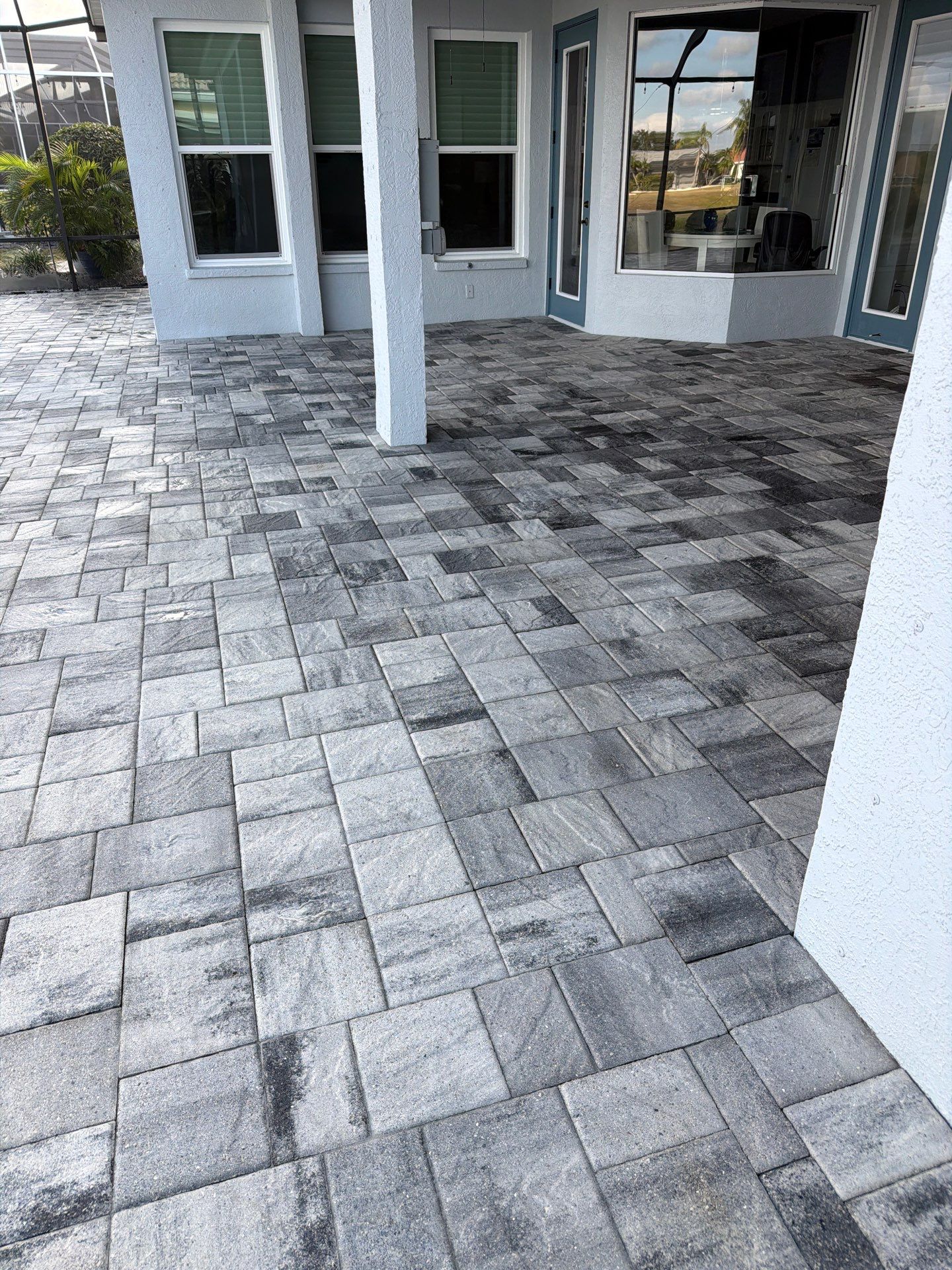 Paver Sealing and Restoration for Screened Lanai in Sun City Center by Supreme Paver Experts