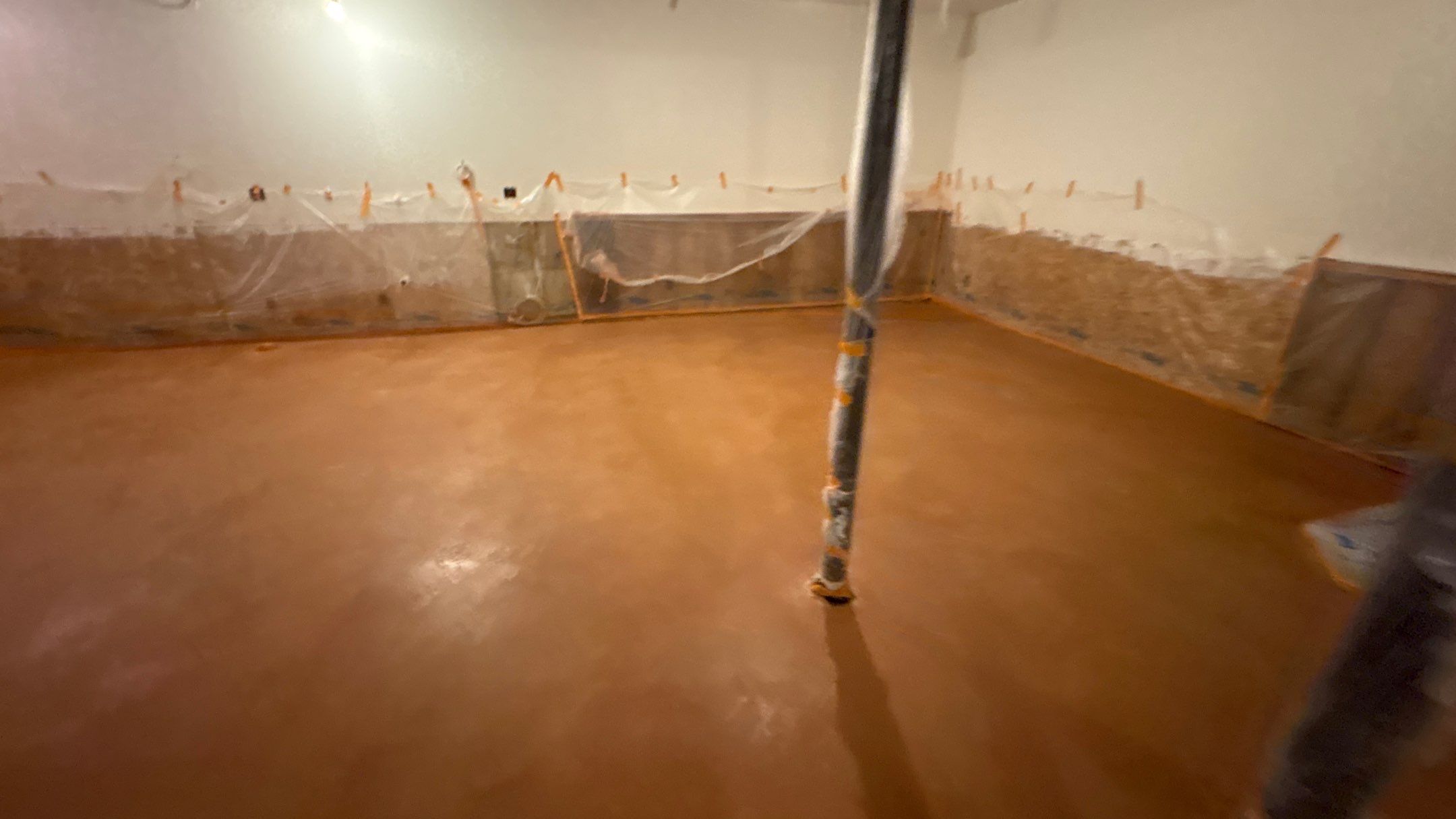 Basement Floor Remodel with Haven Reno KC by Big Red Decorative Concrete, LLC