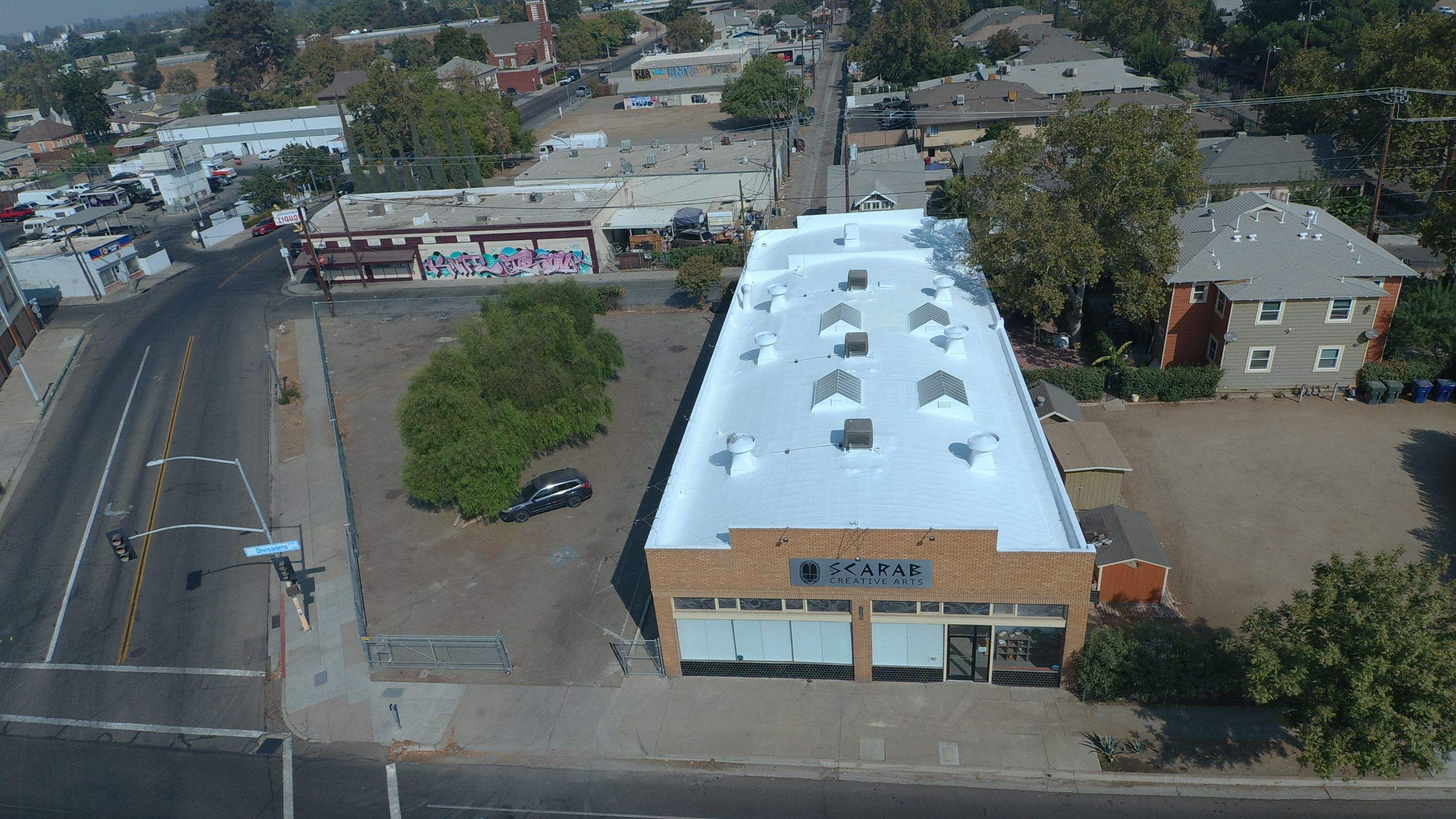 Polyurethane foam roof refurbish and recoating by Straight Edge Roofing Inc