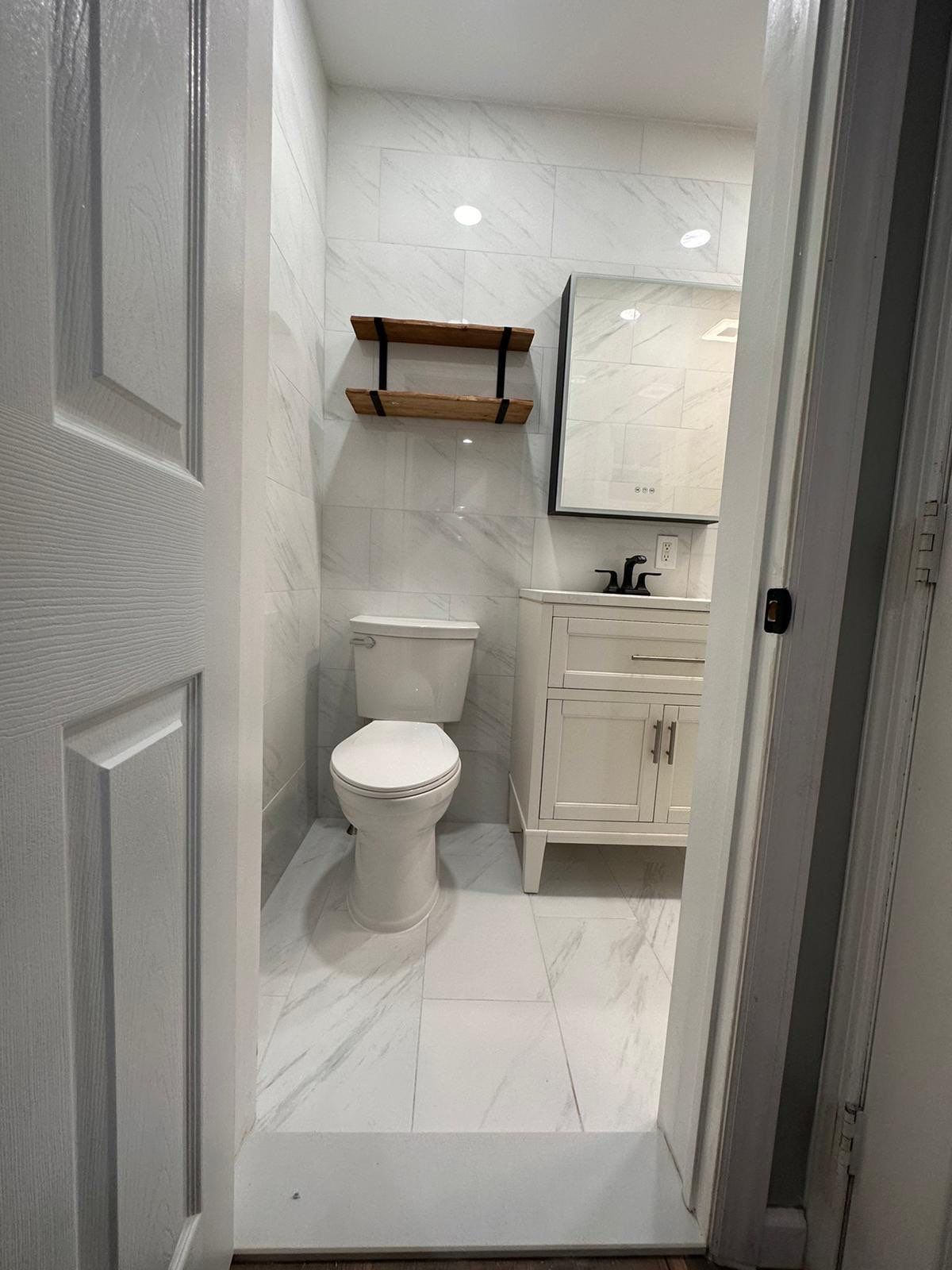 Bathroom Remodel using Tile by Home Concepts Construction