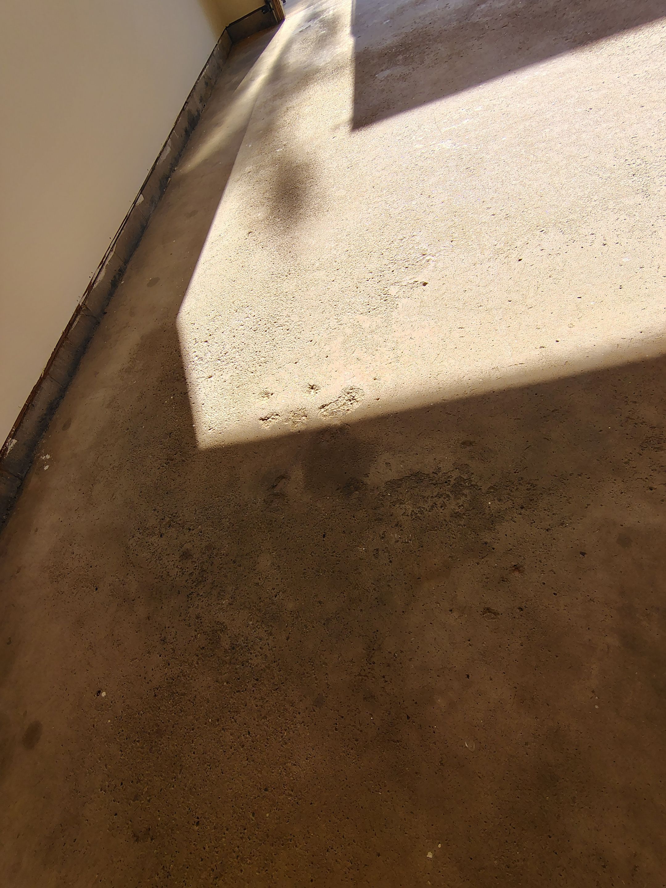 Full-Flake Epoxy Garage Floor Coating Installation in Sioux Falls by Select Painting, Coatings & Garage Cabinets