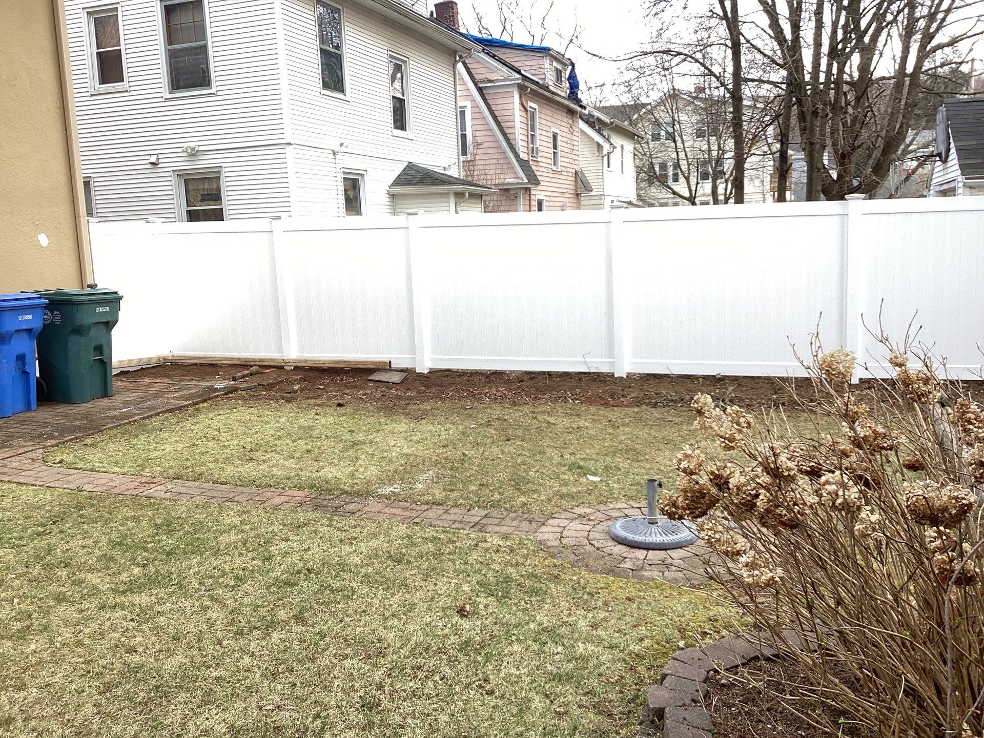Fence replacement with White Vinyl privacy fence by DiGiorgi Roofing and Siding Inc