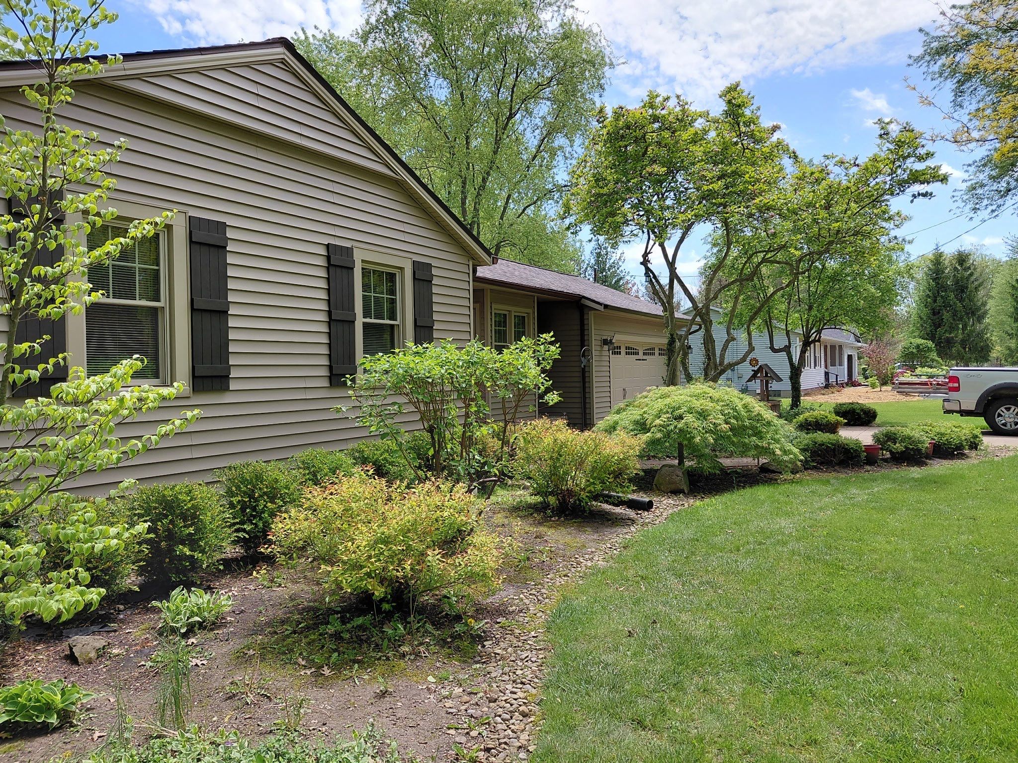 Siding and Garage Door Renovation by Homestyle in Columbia Station by Homestyle Home Improvements (HHI)