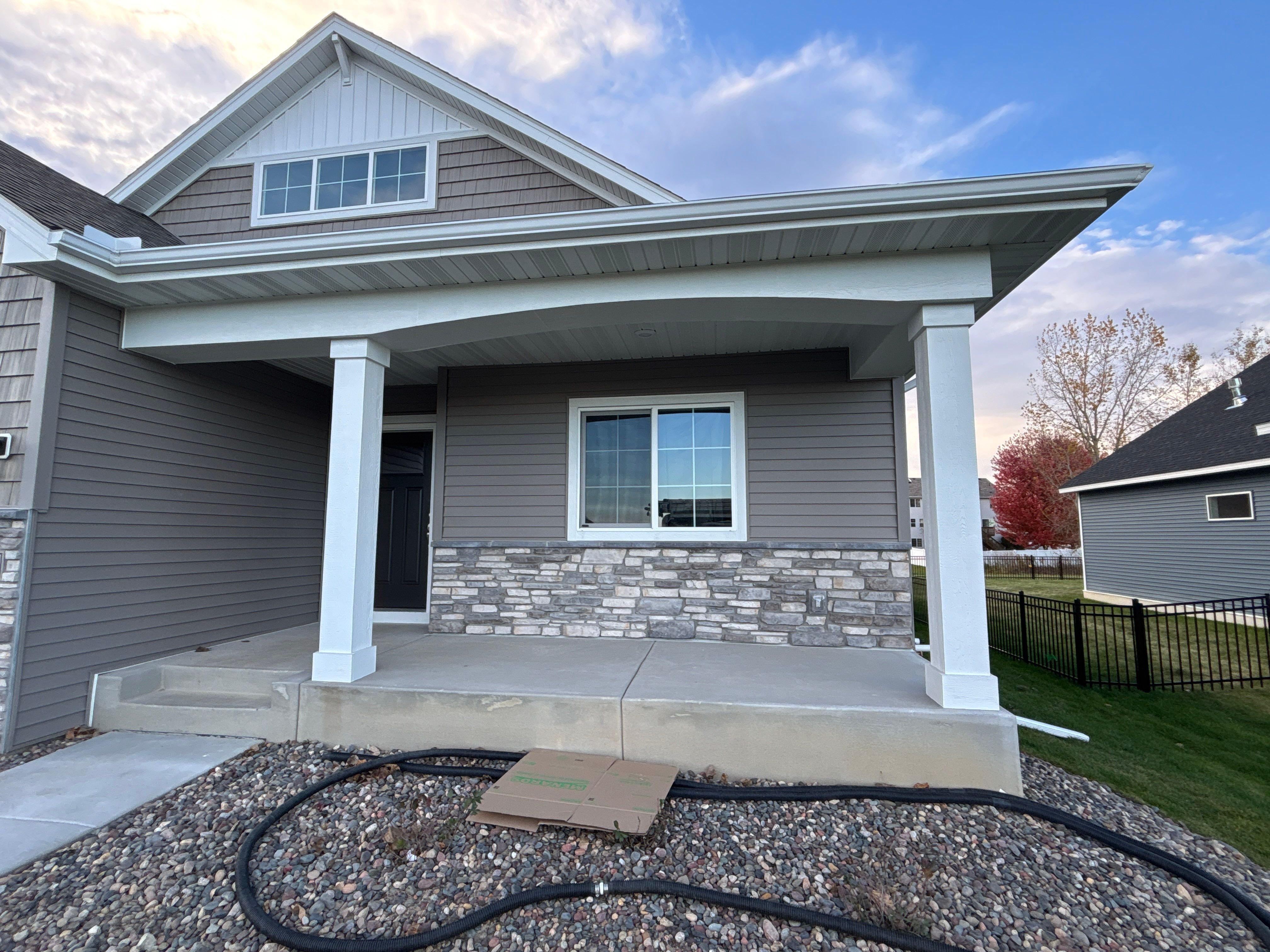 5-Inch Seamless Gutter Installation with Black Steel Screens – Buffalo, MN by Next Level Seamless Gutters / Exteriors Inc.
