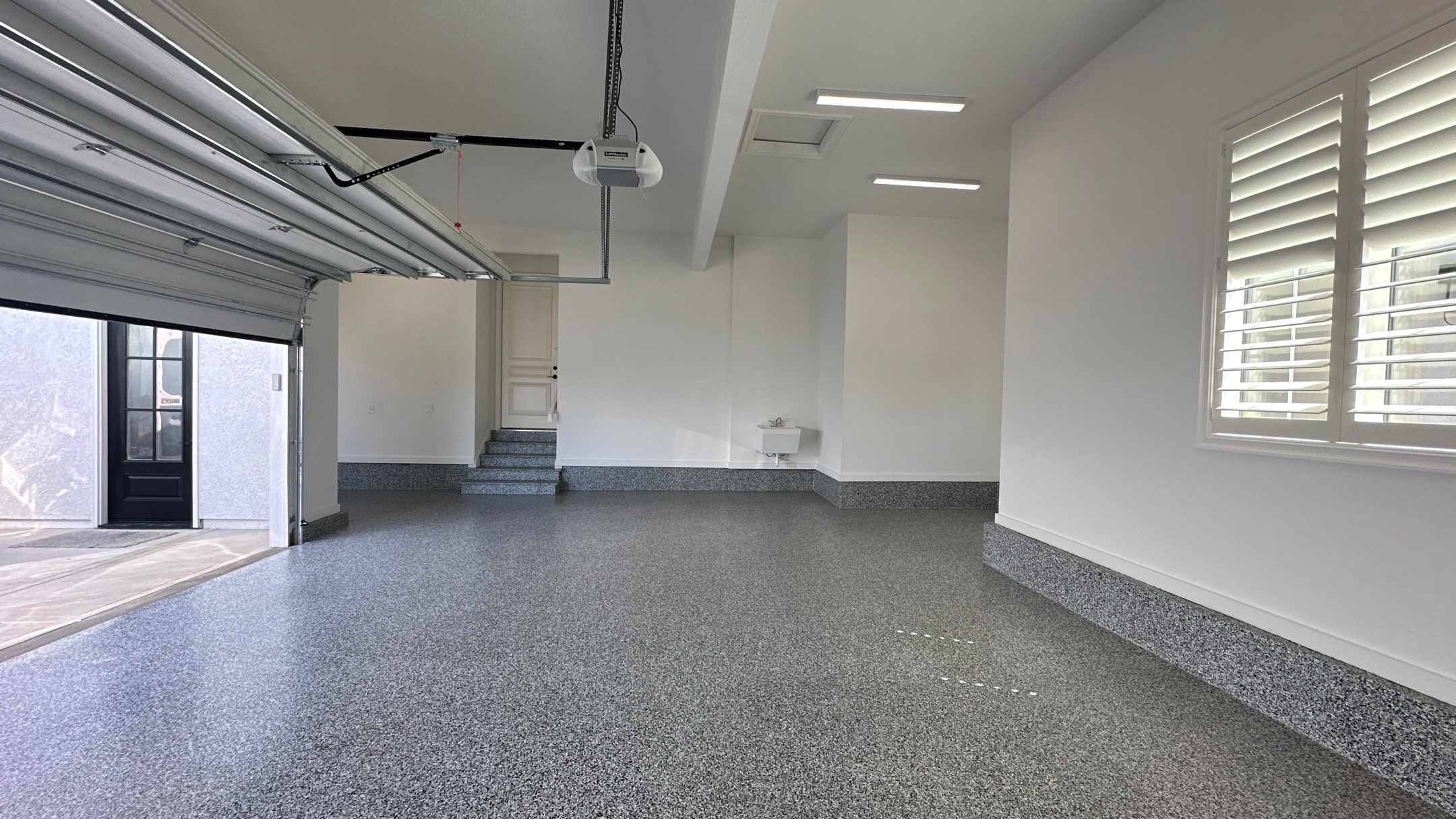 Mike & Pam transformed their garage with a Banner Garage Floor and Cabinets by Banner Garage